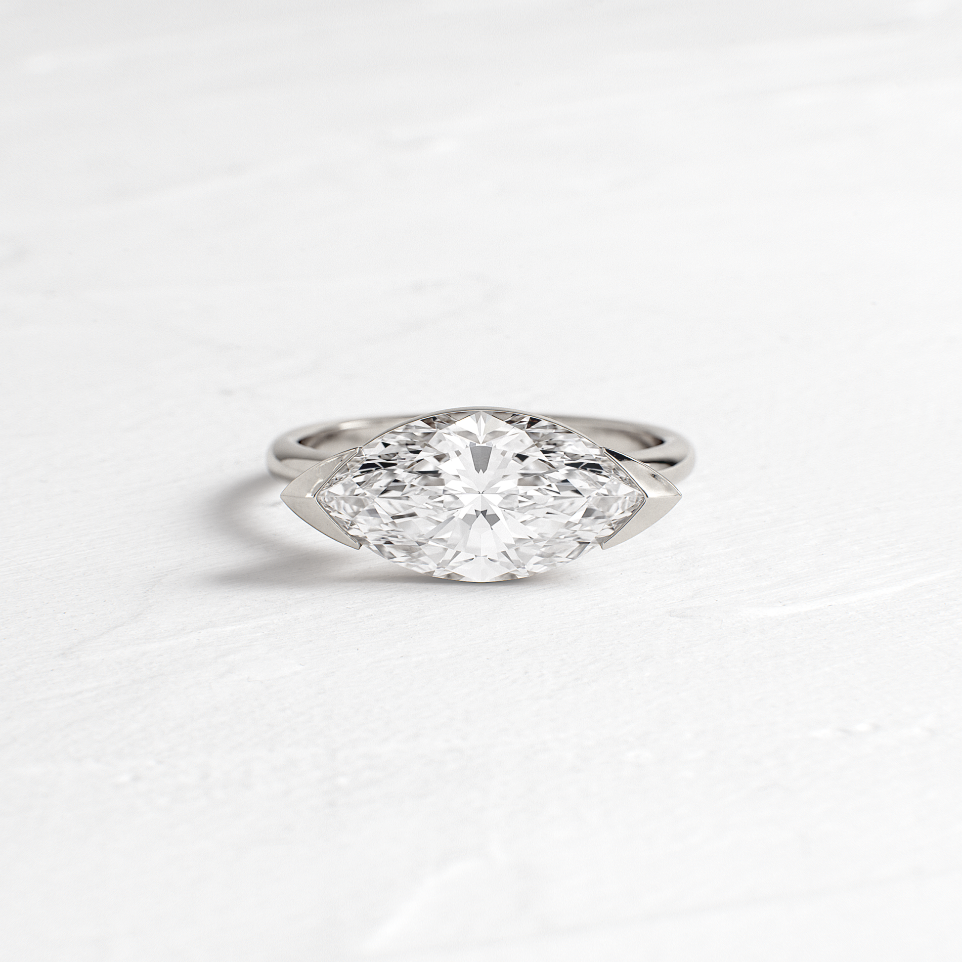 East West Solitaire Half Bezel-Marquise Lab Grown Diamond Engagement Ring