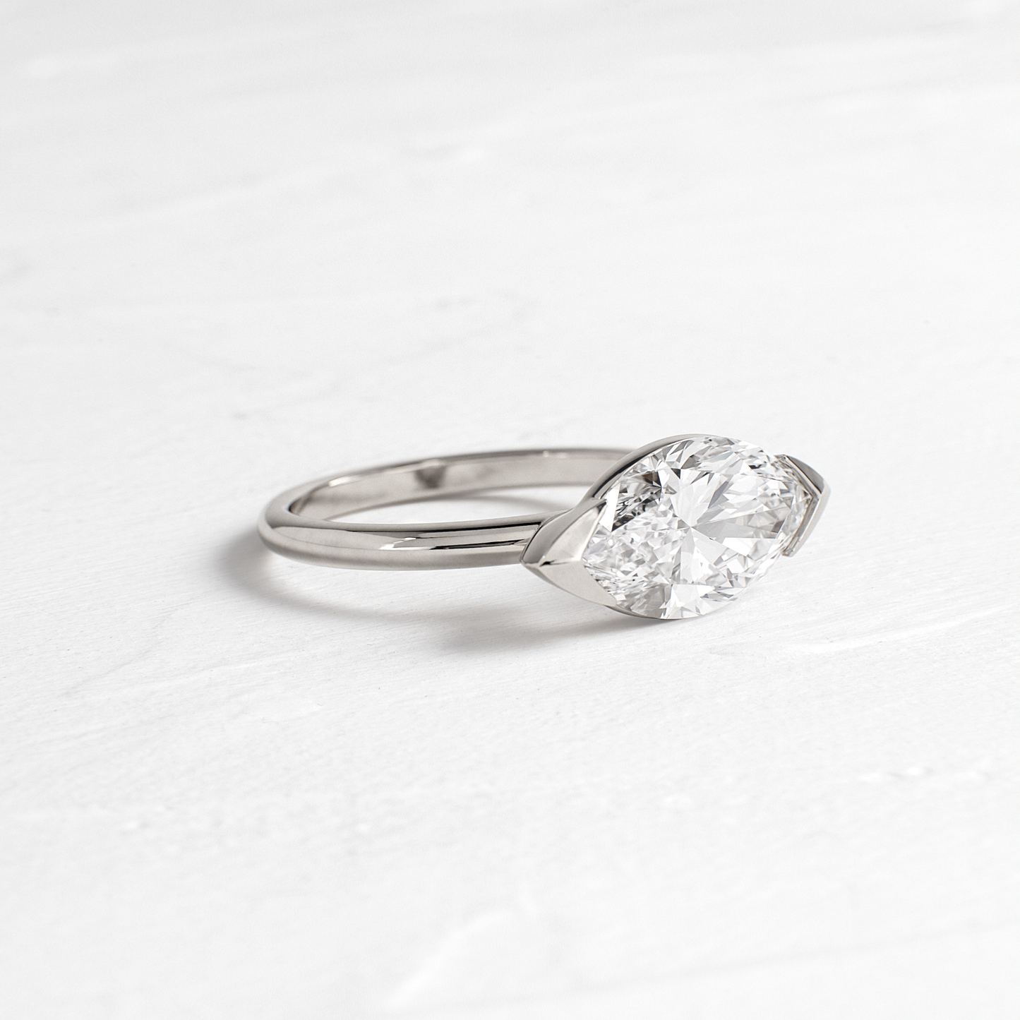 East West Solitaire Half Bezel-Marquise Lab Grown Diamond Engagement Ring