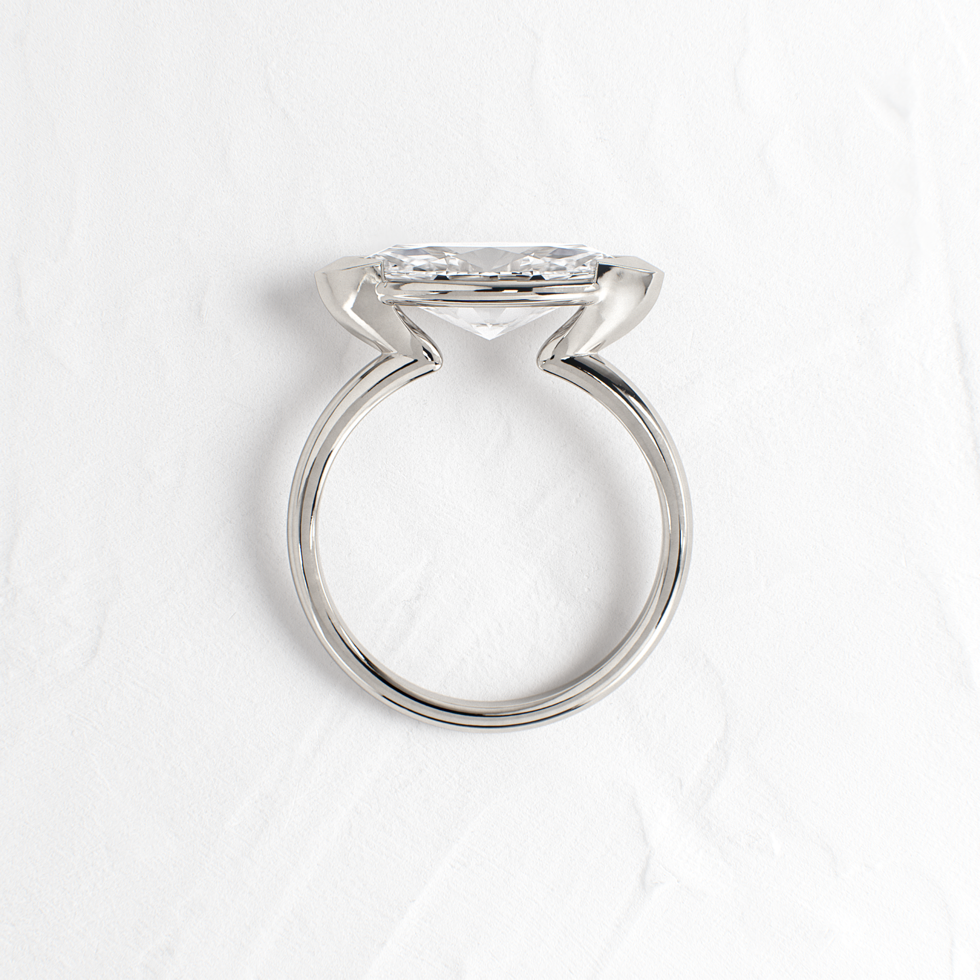 East West Solitaire Half Bezel-Marquise Lab Grown Diamond Engagement Ring