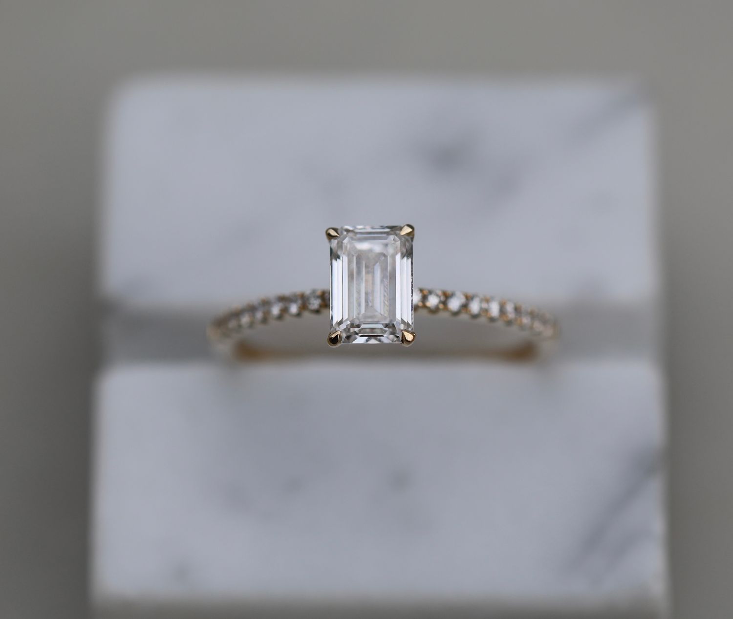 Elegant 0.90 CT Emerald Cut Lab-Grown Diamond Pave Engagement Ring 1