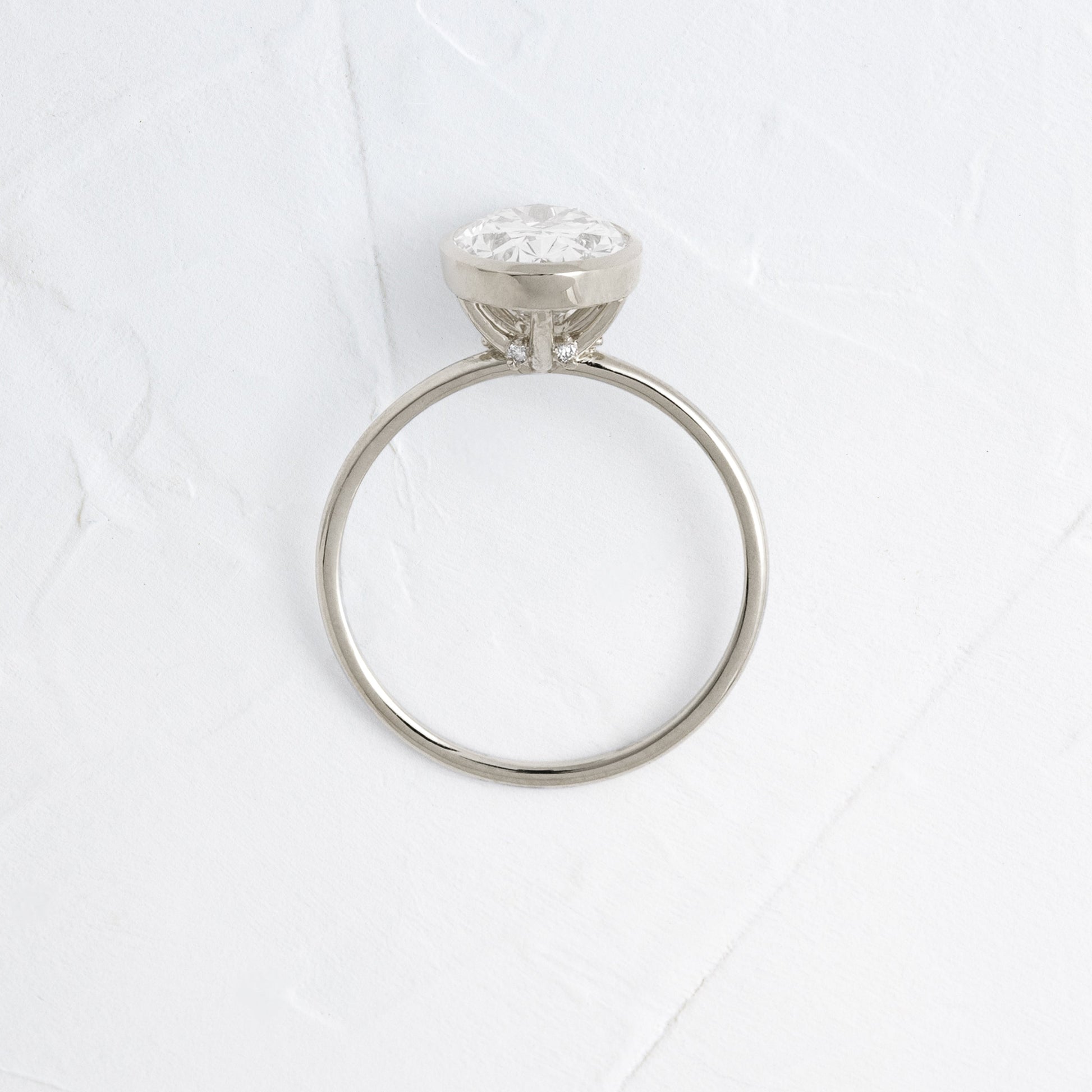 Bezel with Hidden Stones-Oval Lab Grown Diamond Engagement Ring