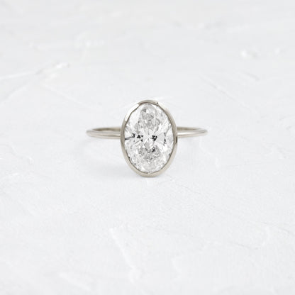 Bezel with Hidden Stones-Oval Lab Grown Diamond Engagement Ring