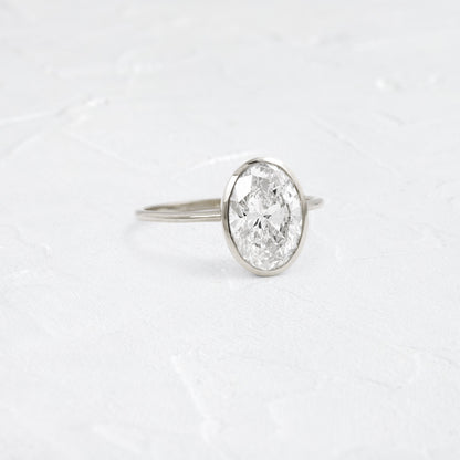 Bezel with Hidden Stones-Oval Lab Grown Diamond Engagement Ring