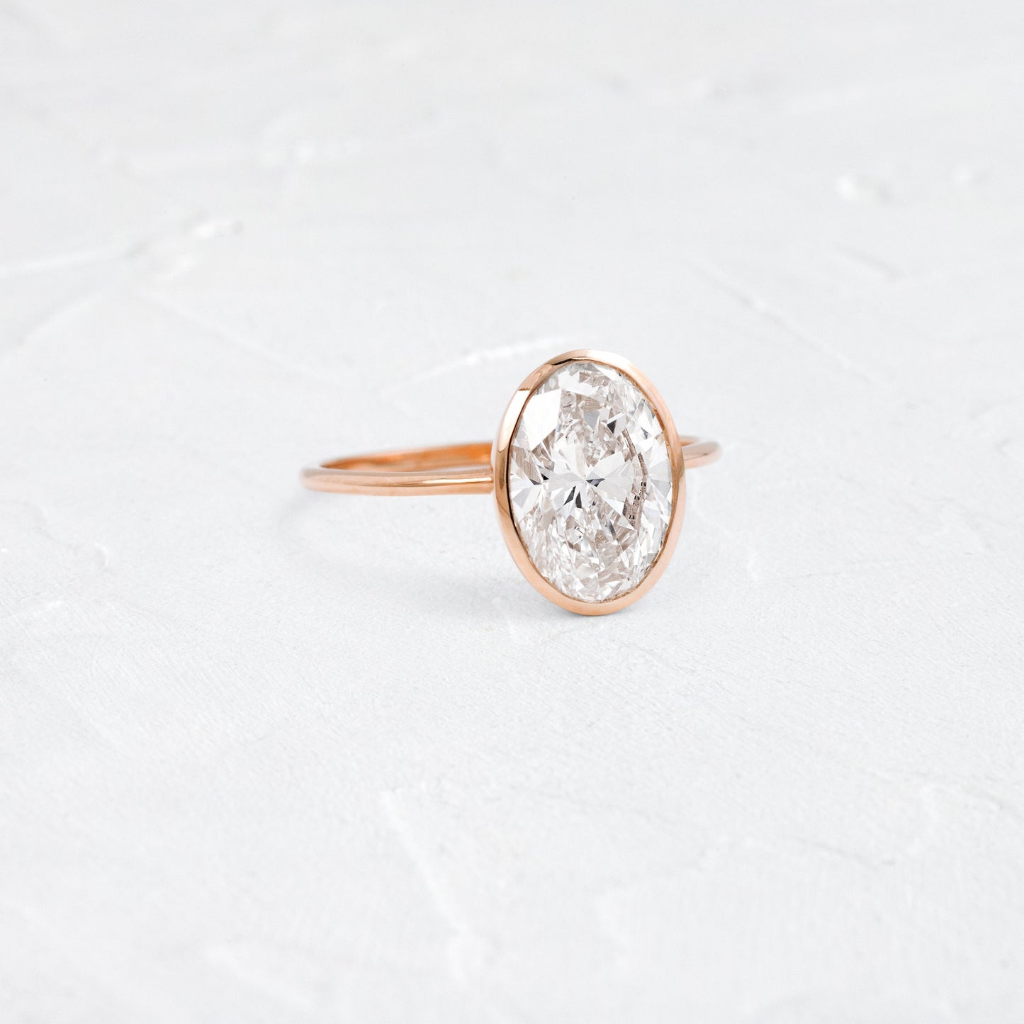 Bezel with Hidden Stones-Oval Lab Grown Diamond Engagement Ring