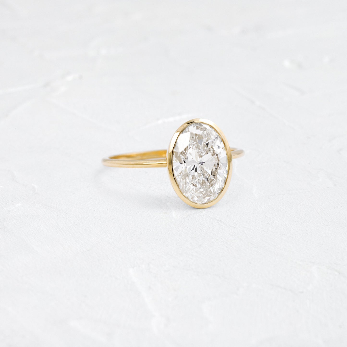 Bezel Hidden Stone-Oval Lab Grown Diamond Engagement Ring