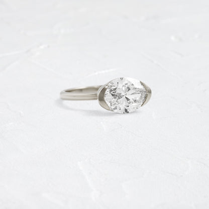 East West Solitaire Half Bezel-Oval Lab Grown Diamond Engagement Ring