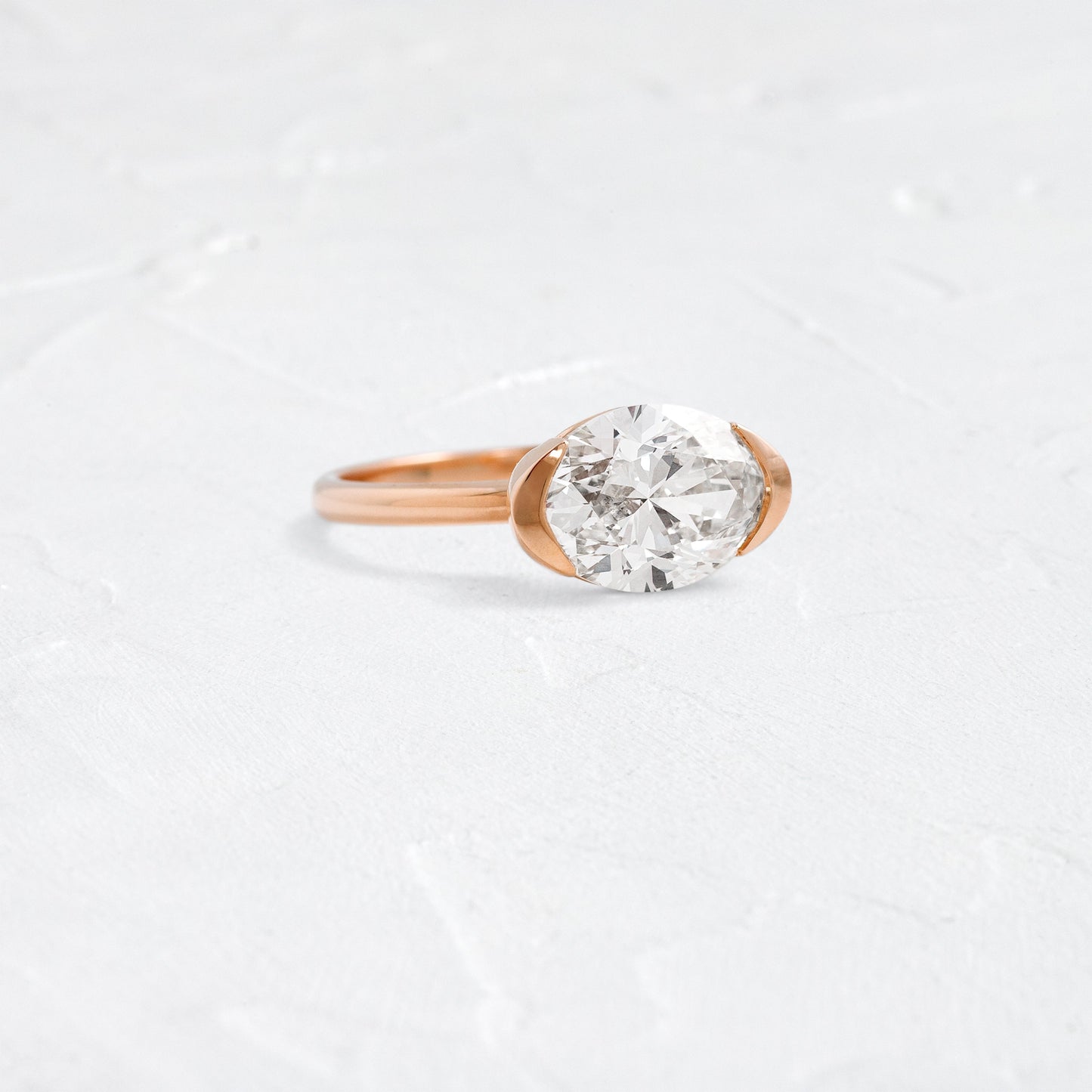 East West Solitaire Half Bezel-Oval Lab Grown Diamond Engagement Ring