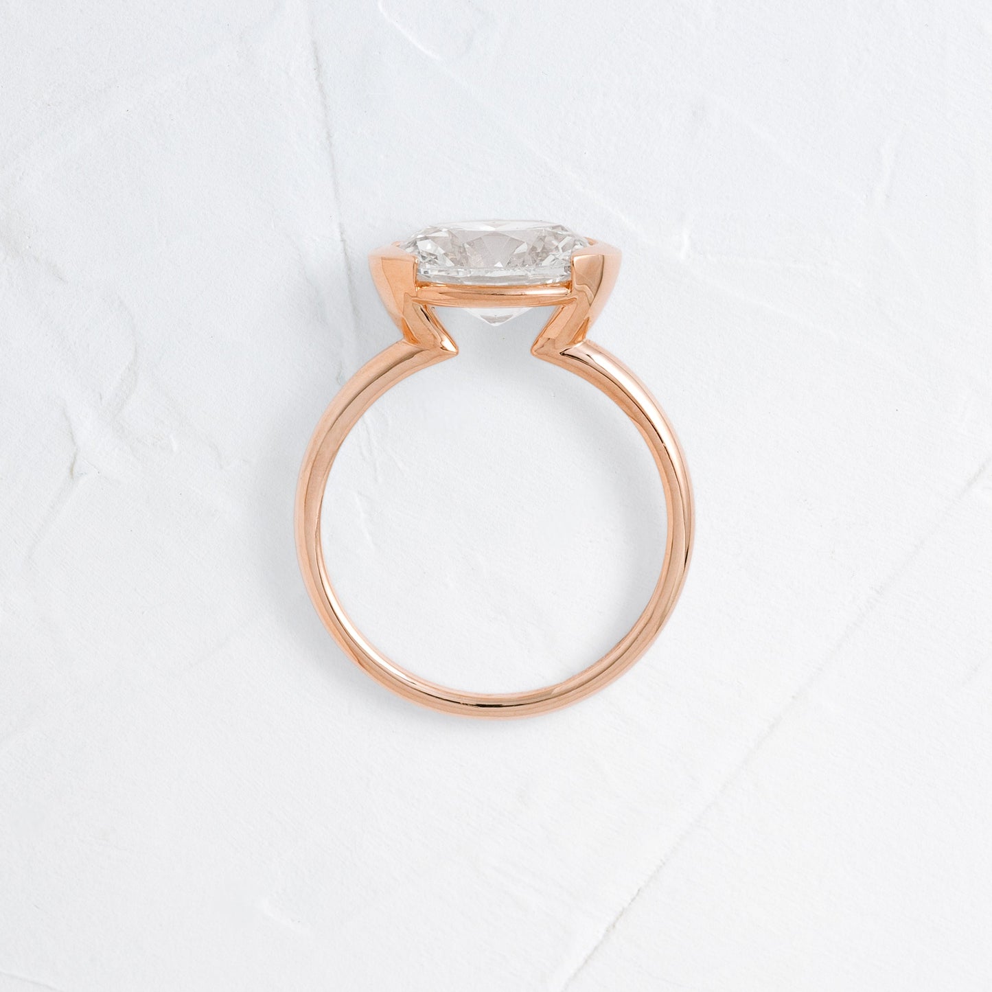 East West Solitaire Half Bezel-Oval Lab Grown Diamond Engagement Ring