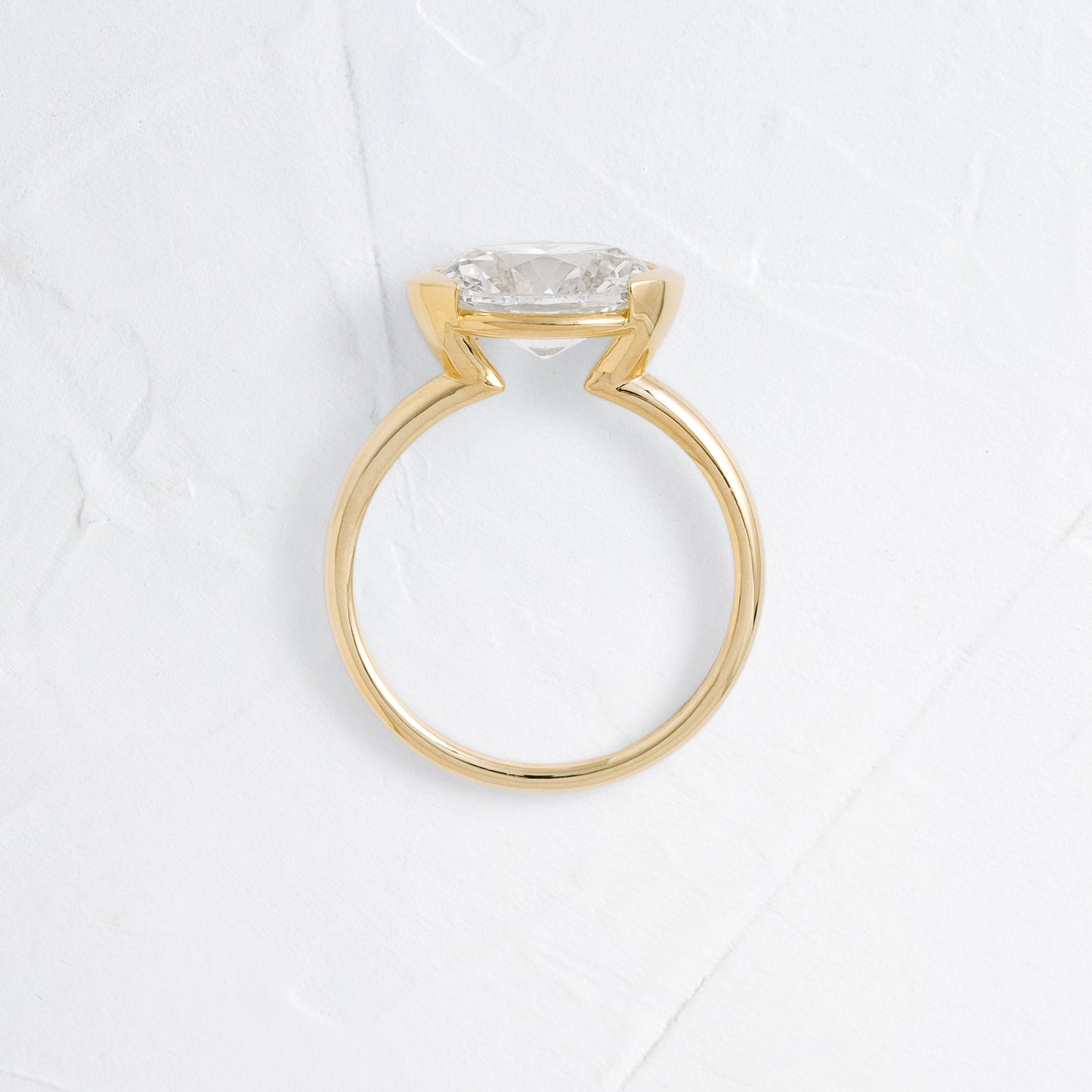 East West Solitaire Half Bezel-Oval Lab Grown Diamond Engagement Ring