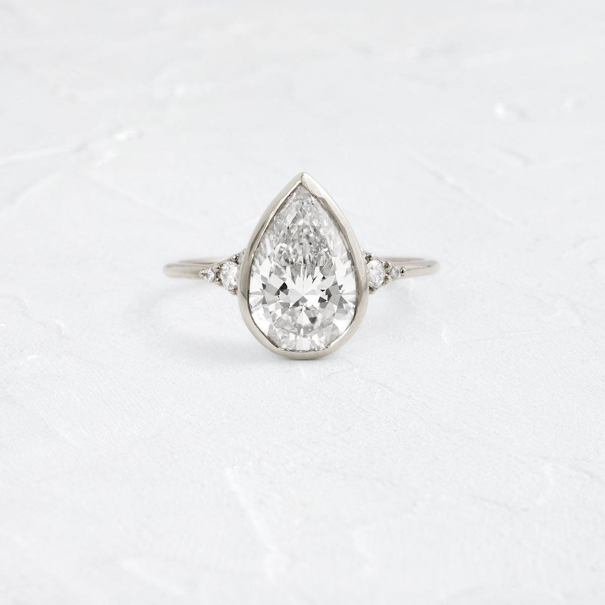 Bezel & Cluster Style-Pear Lab Grown Diamond Engagement Ring