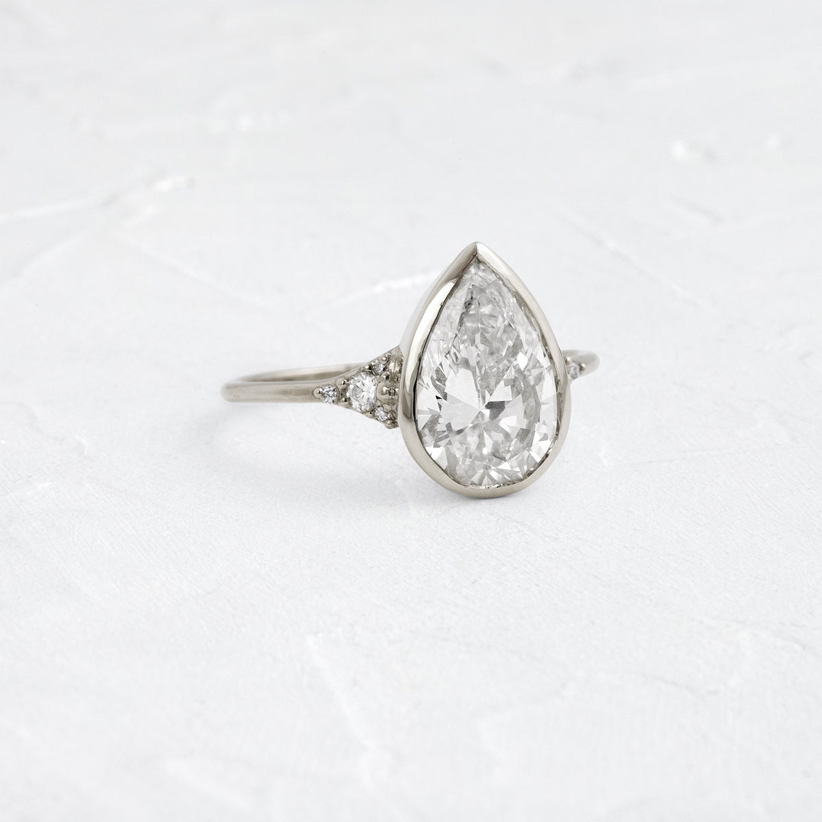 Bezel & Cluster Style-Pear Lab Grown Diamond Engagement Ring
