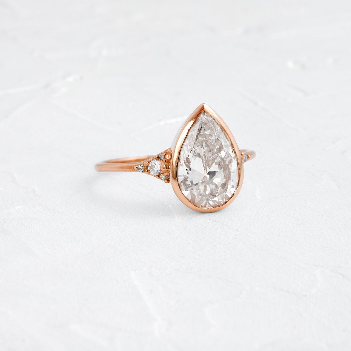Bezel & Cluster Style-Pear Lab Grown Diamond Engagement Ring