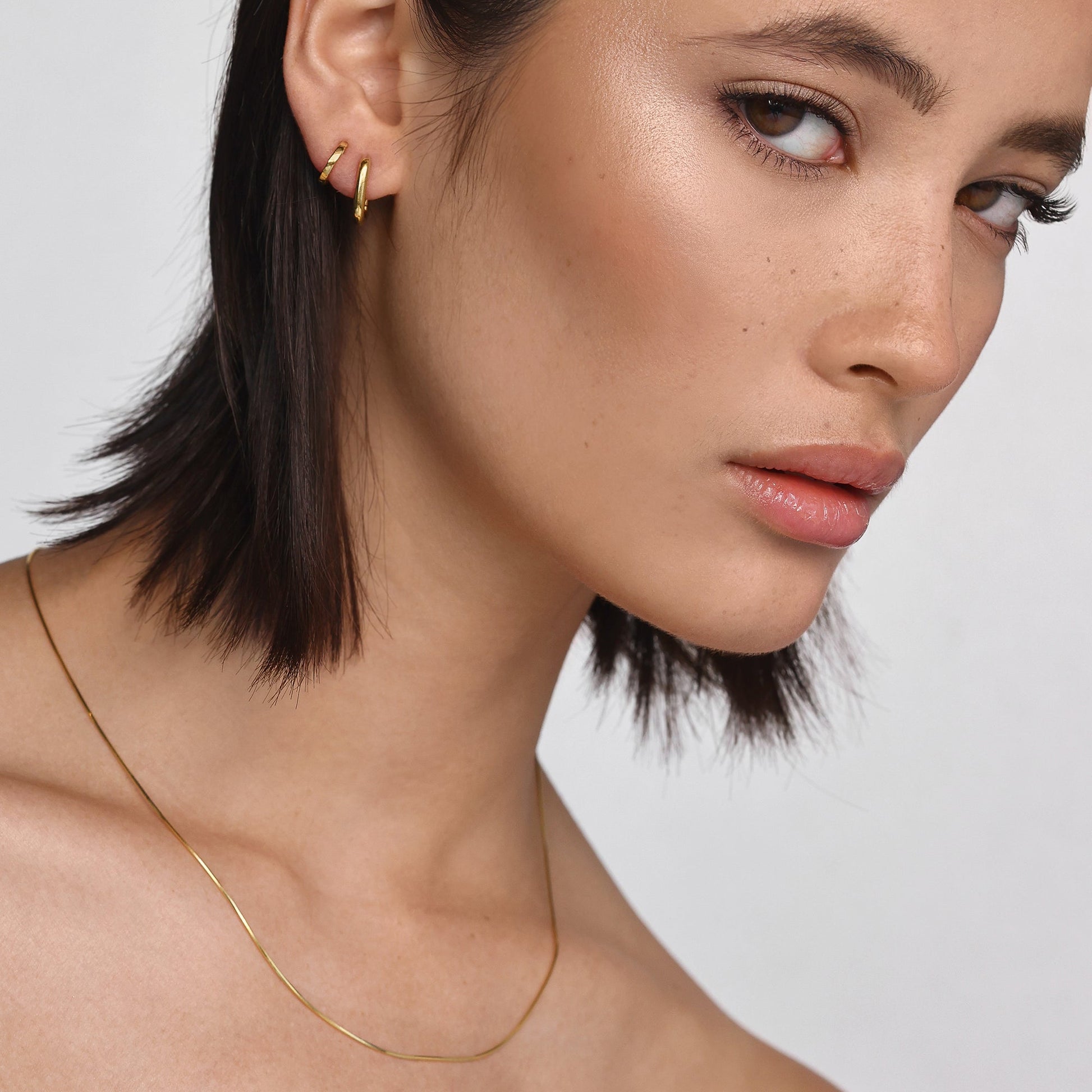 Sleek Gold Elongated Huggie Hoop Earrings 10