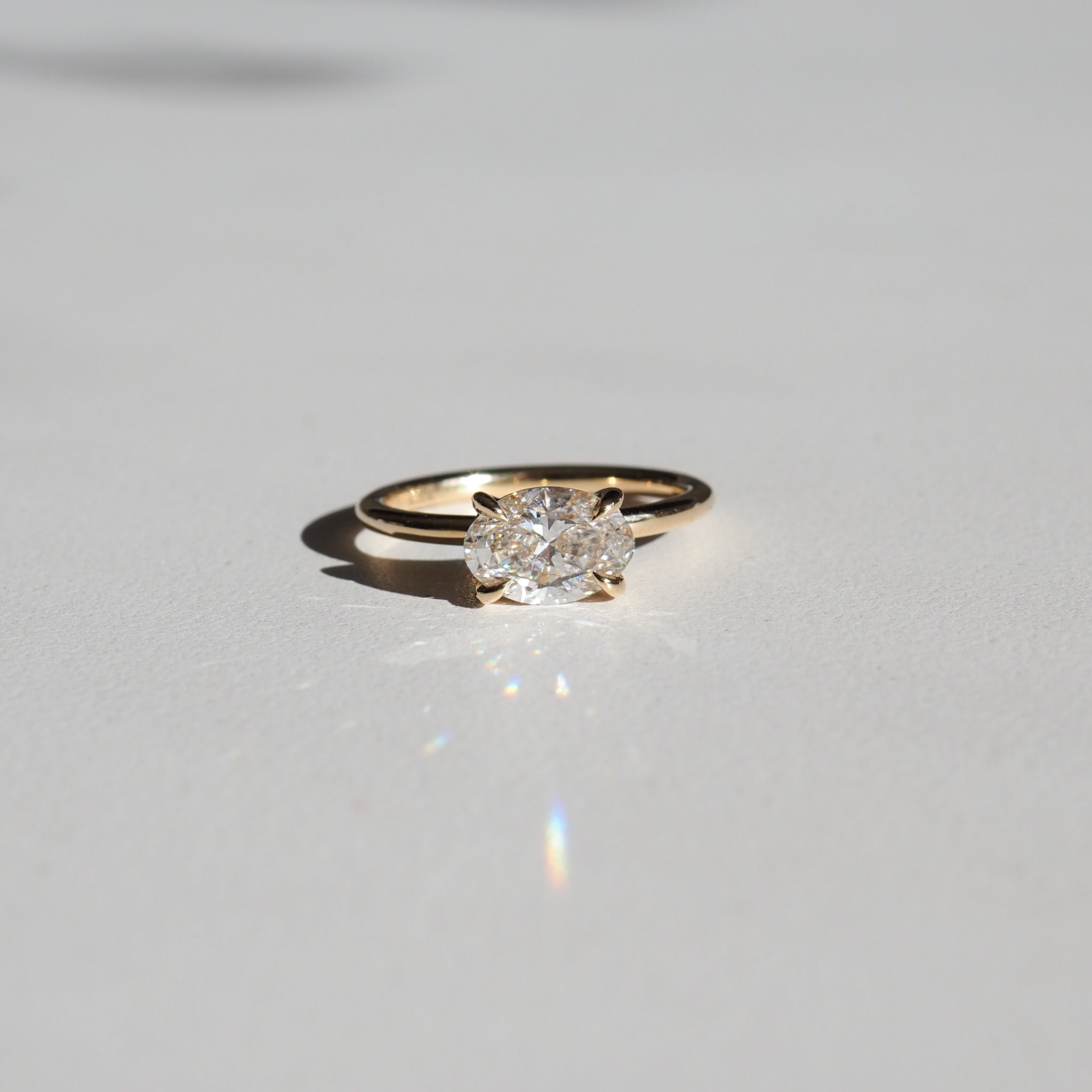 1.50 CT Oval Lab Created Diamond East West Solitaire Ring