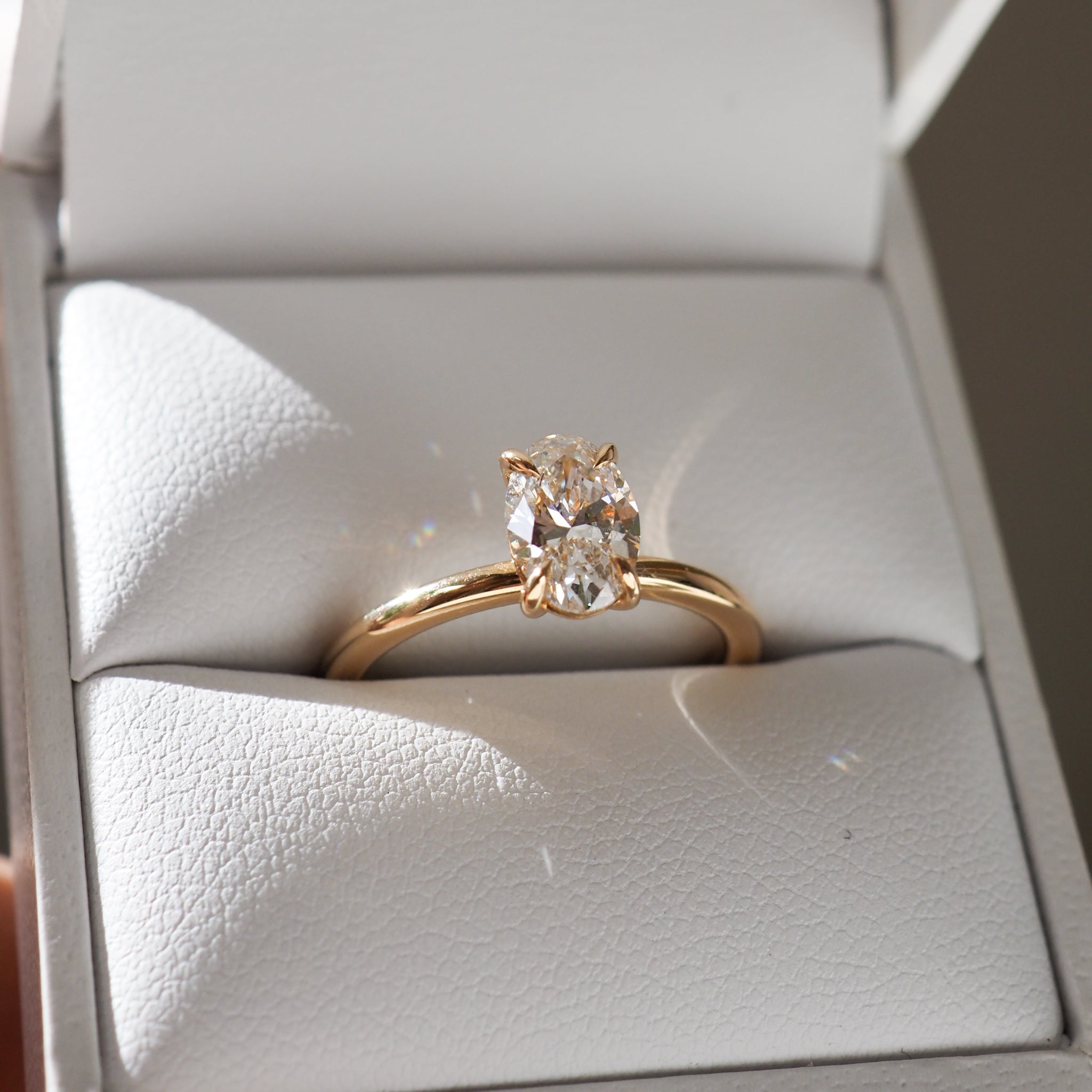 1.0 CT Oval Lab Grown Diamond Solitaire Engagement Ring in Classic Gold Setting