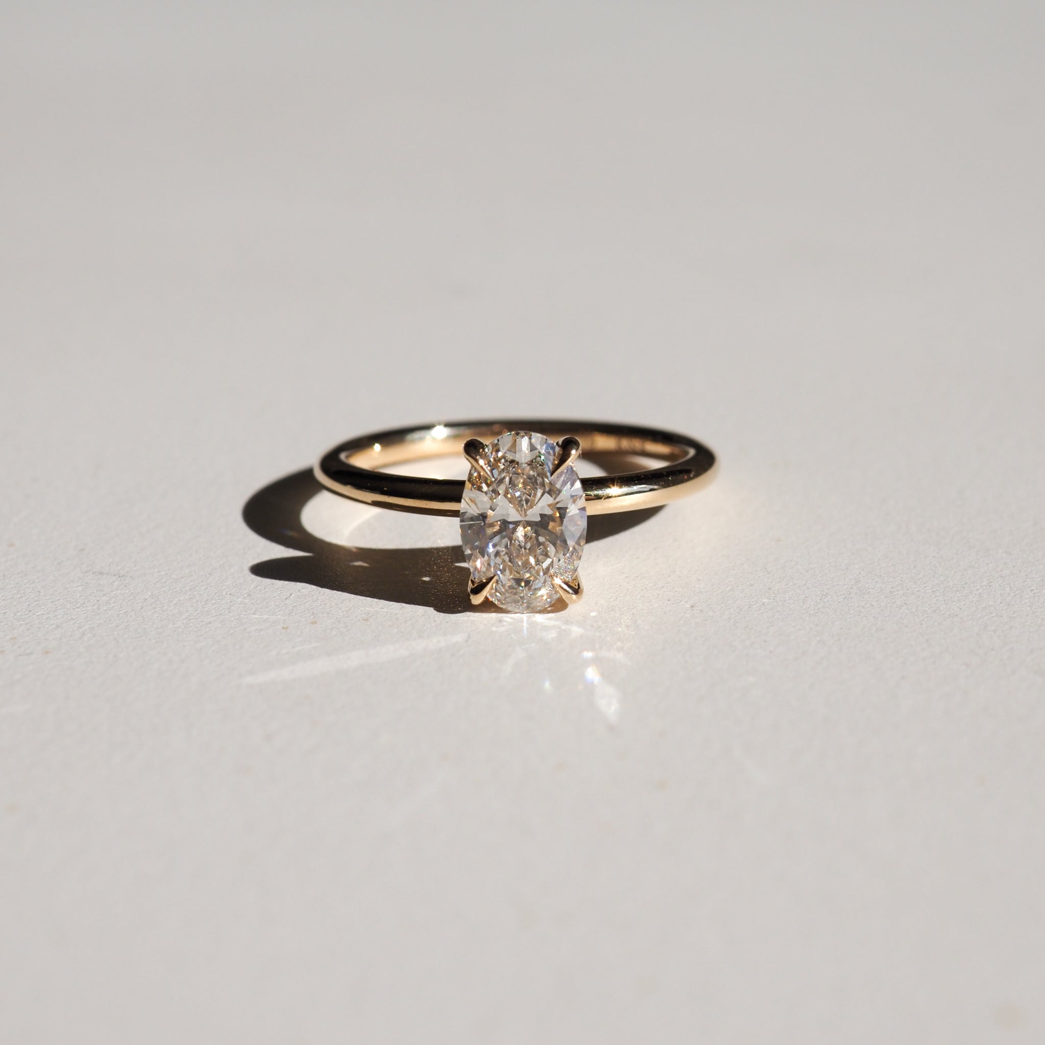 1.0 CT Oval Lab Grown Diamond Solitaire Engagement Ring in Gold 1