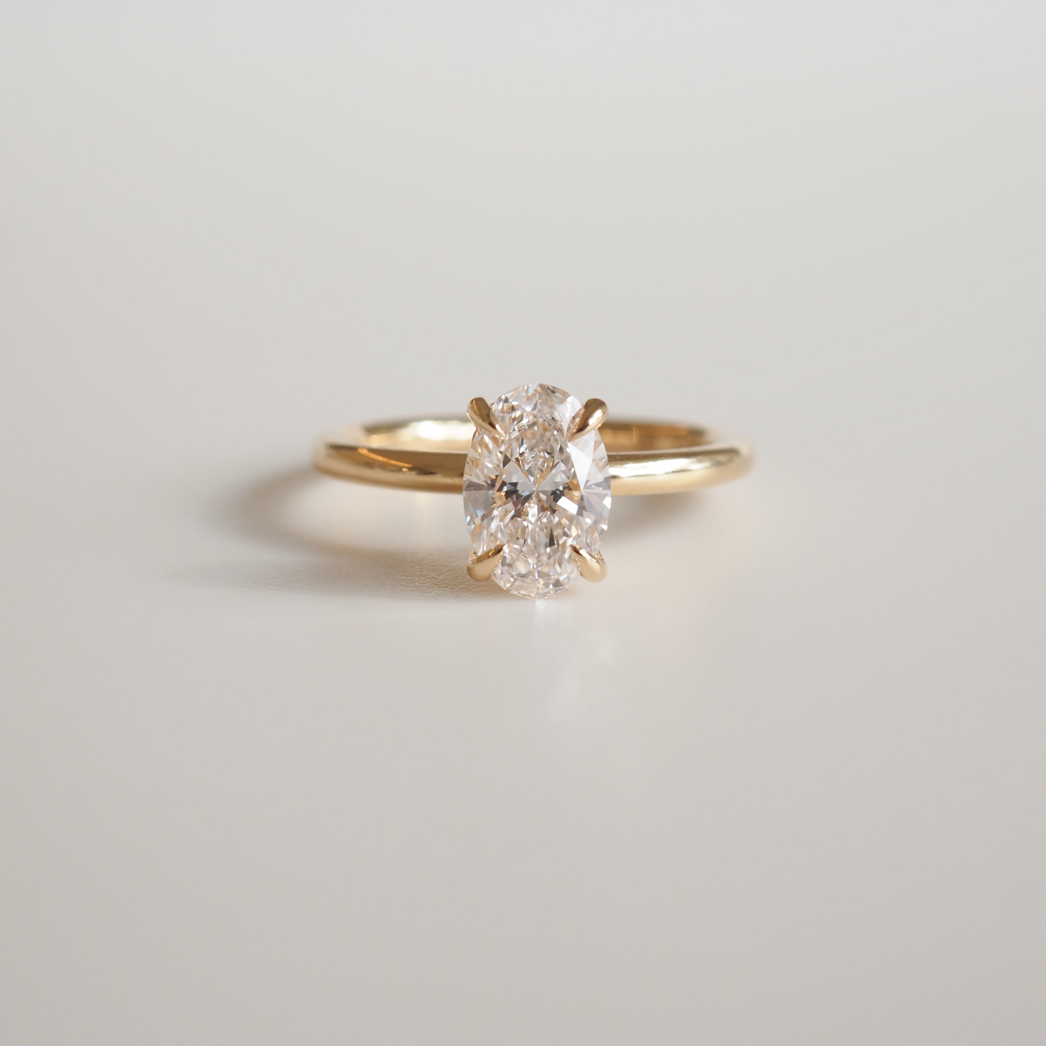 1.0 CT Oval Lab Grown Diamond Solitaire Engagement Ring in Classic Gold Setting