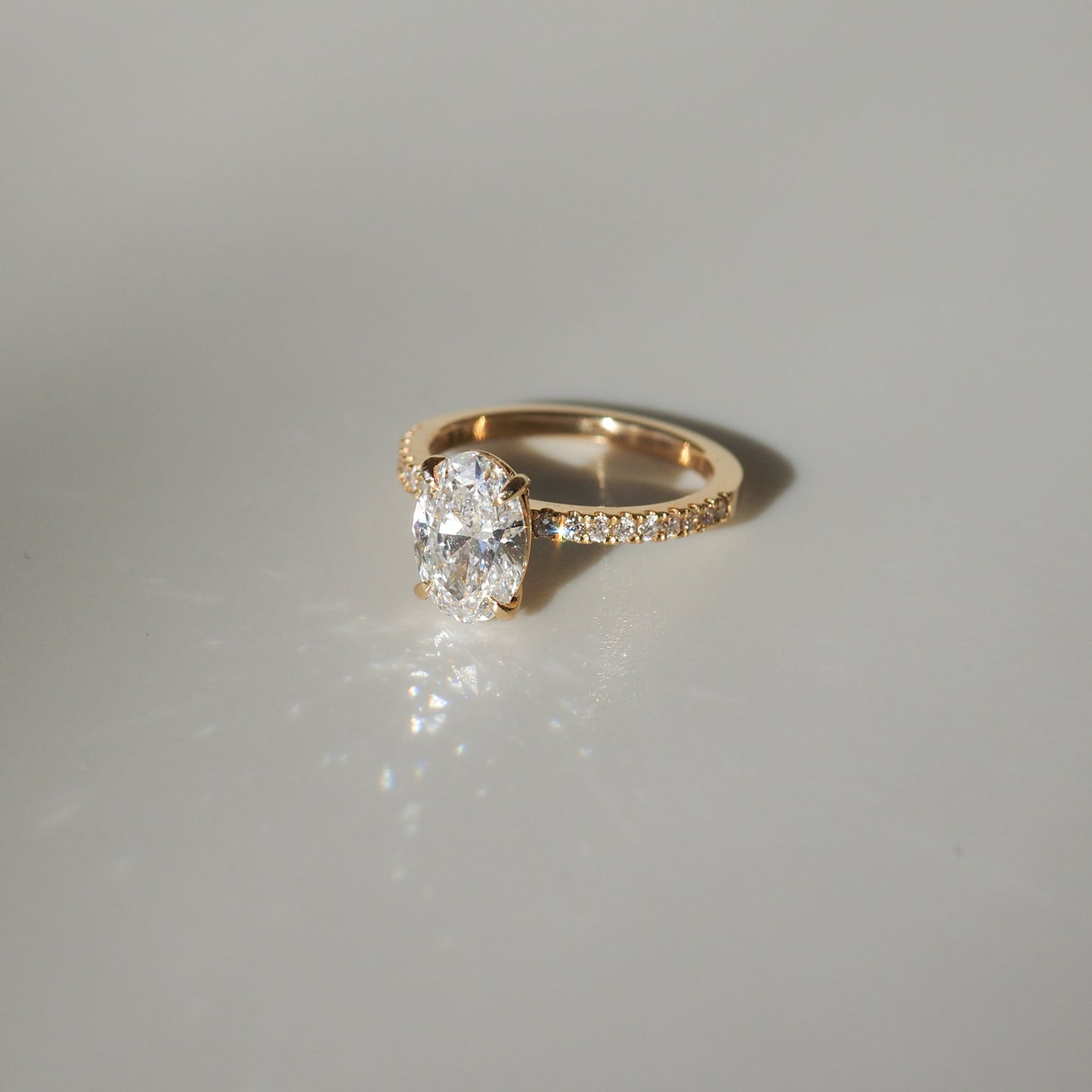 1.50 CT Oval Lab Grown Diamond Pave Engagement Ring in Radiant Elegance 4