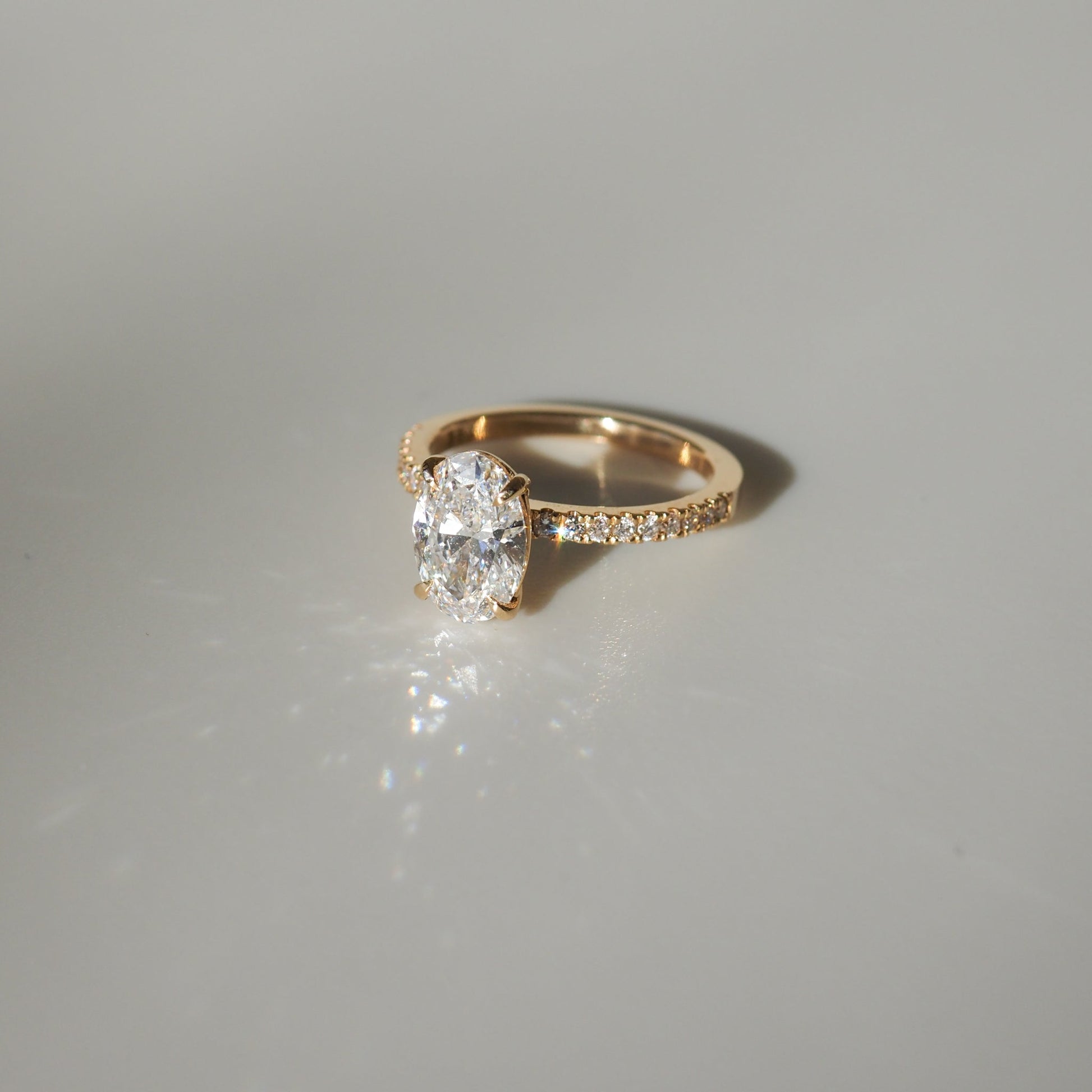 1.50 CT Oval Lab Grown Diamond Pave Engagement Ring in Radiant Elegance 4