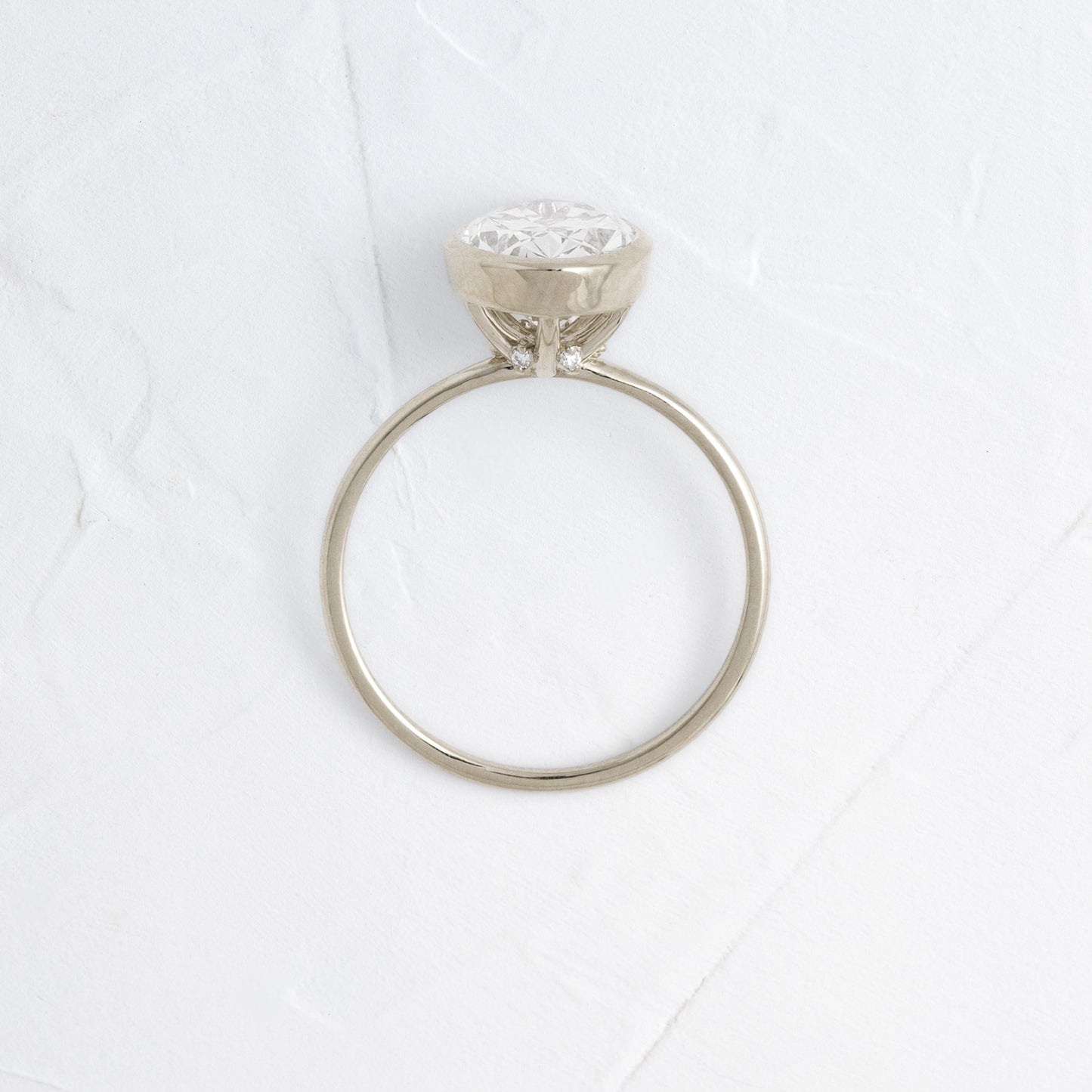 Solitaire Bezel with Hidden Stones-Marquise Lab Grown Diamond Engagement Ring