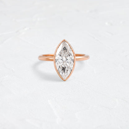 Solitaire Bezel with Hidden Stones-Marquise Lab Grown Diamond Engagement Ring