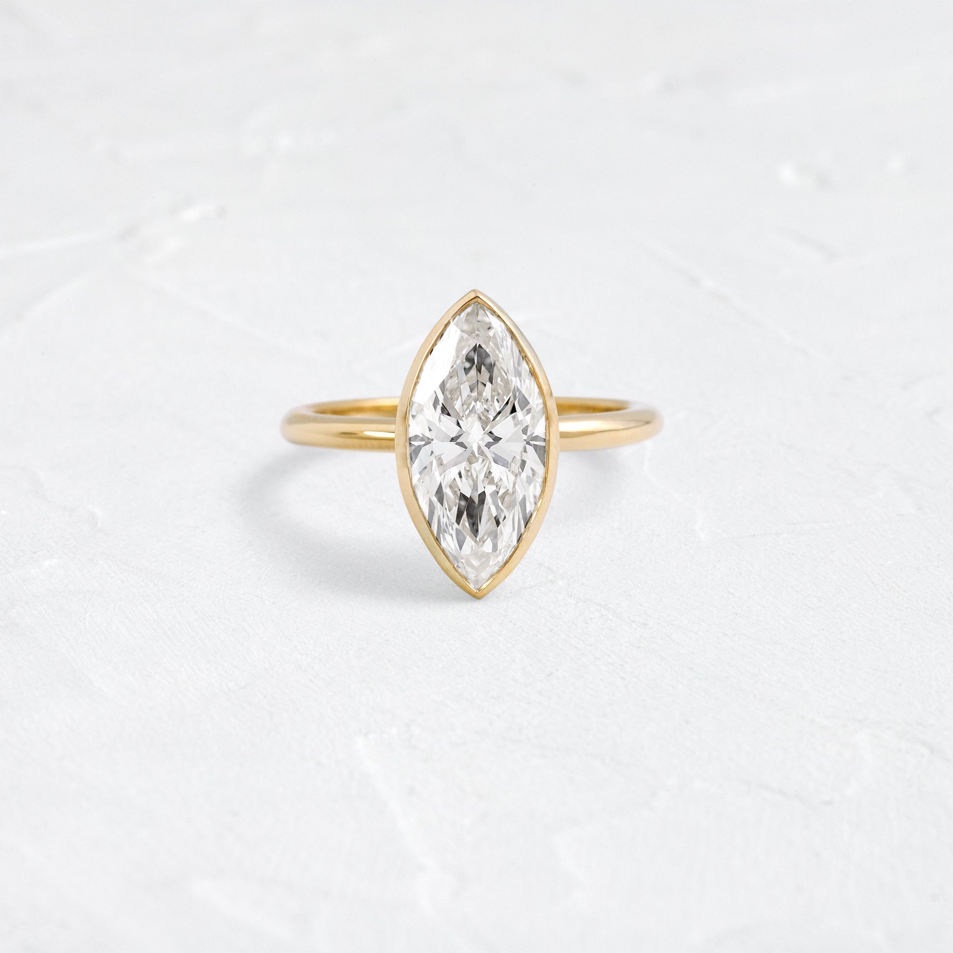 Solitaire Bezel with Hidden Stones-Marquise Lab Grown Diamond Engagement Ring