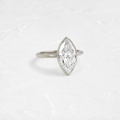 Solitaire Bezel with Hidden Stones-Marquise Lab Grown Diamond Engagement Ring