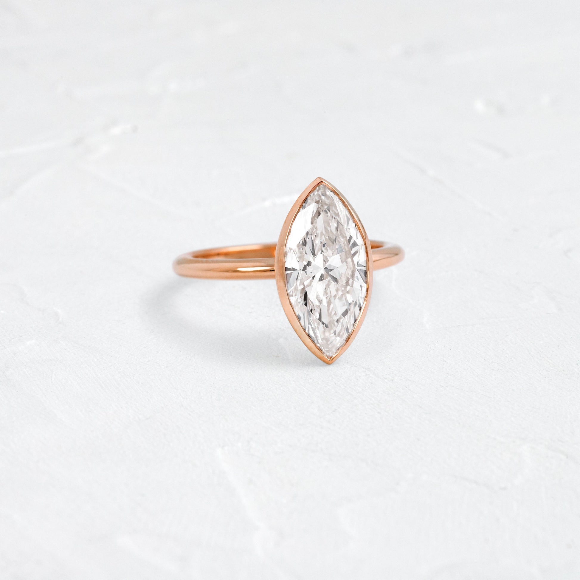 Solitaire Bezel with Hidden Stones-Marquise Lab Grown Diamond Engagement Ring