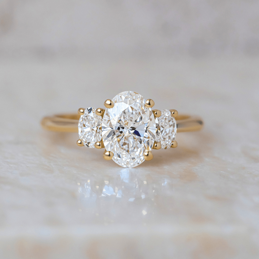 Three Stone with Hidden Details-Oval Lab Grown Diamond Engagement Ring