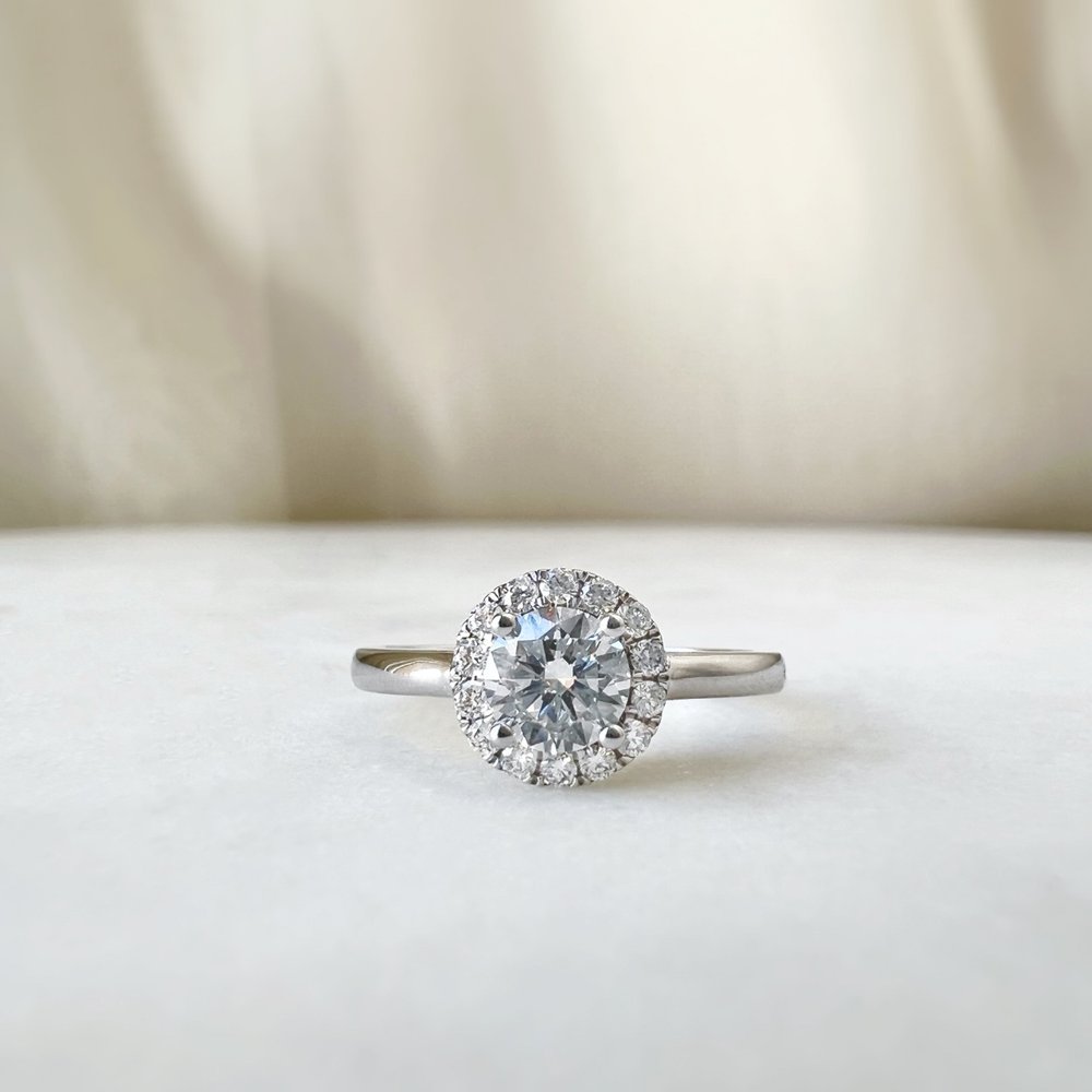 Stunning 0.50 CT Round Lab-Grown Diamond Halo Engagement Ring