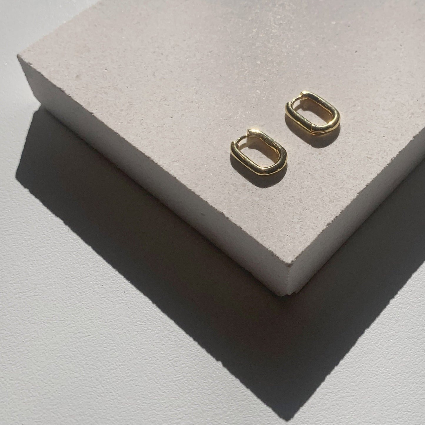 Sleek Gold Elongated Huggie Hoop Earrings 3