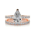 Load image into Gallery viewer, Radiant Elegance: 1.50 CT Pear Lab Grown Diamond Bridal Ring Set
