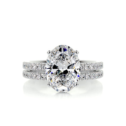 Elegance Defined: 3.0 CT Oval Lab Grown Diamond Hidden Halo Bridal Set 1