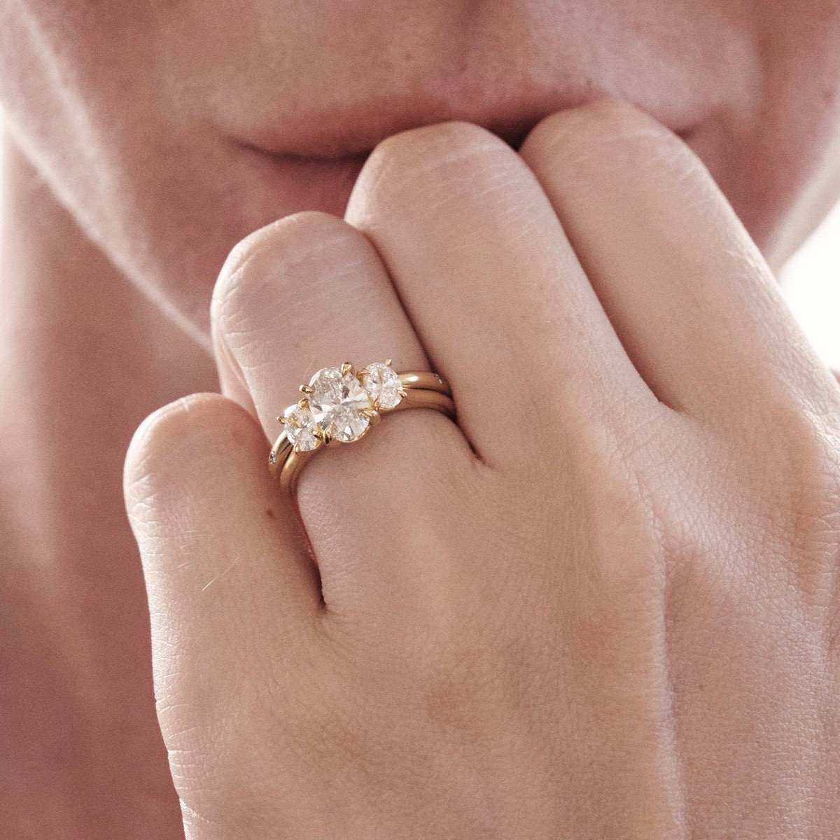 Elegant 1.0 CT Oval Lab Grown Diamond Trio Engagement Ring 1