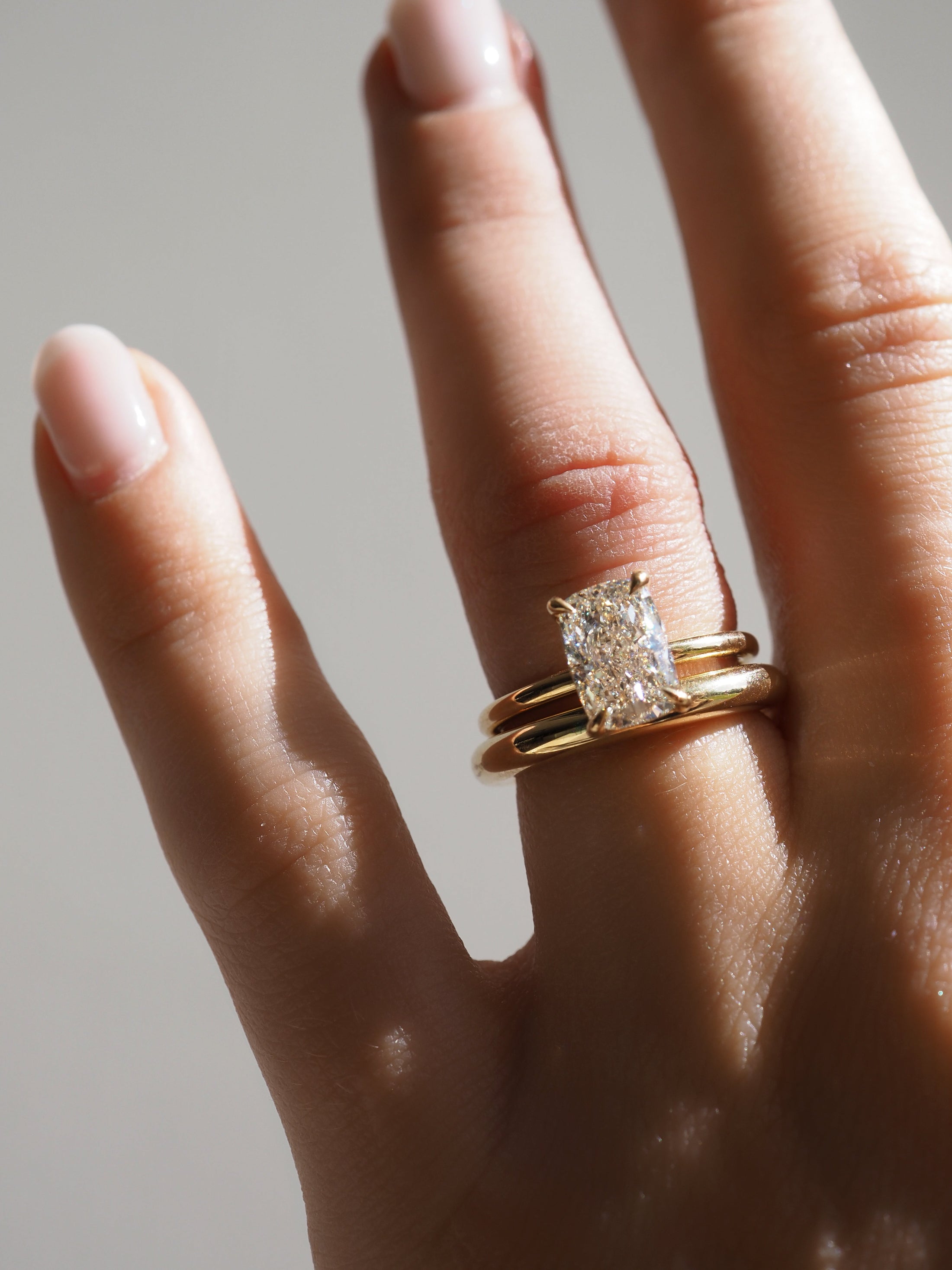 1.50 CT Elongated Cushion Lab-Grown Diamond Solitaire Ring in Gold.