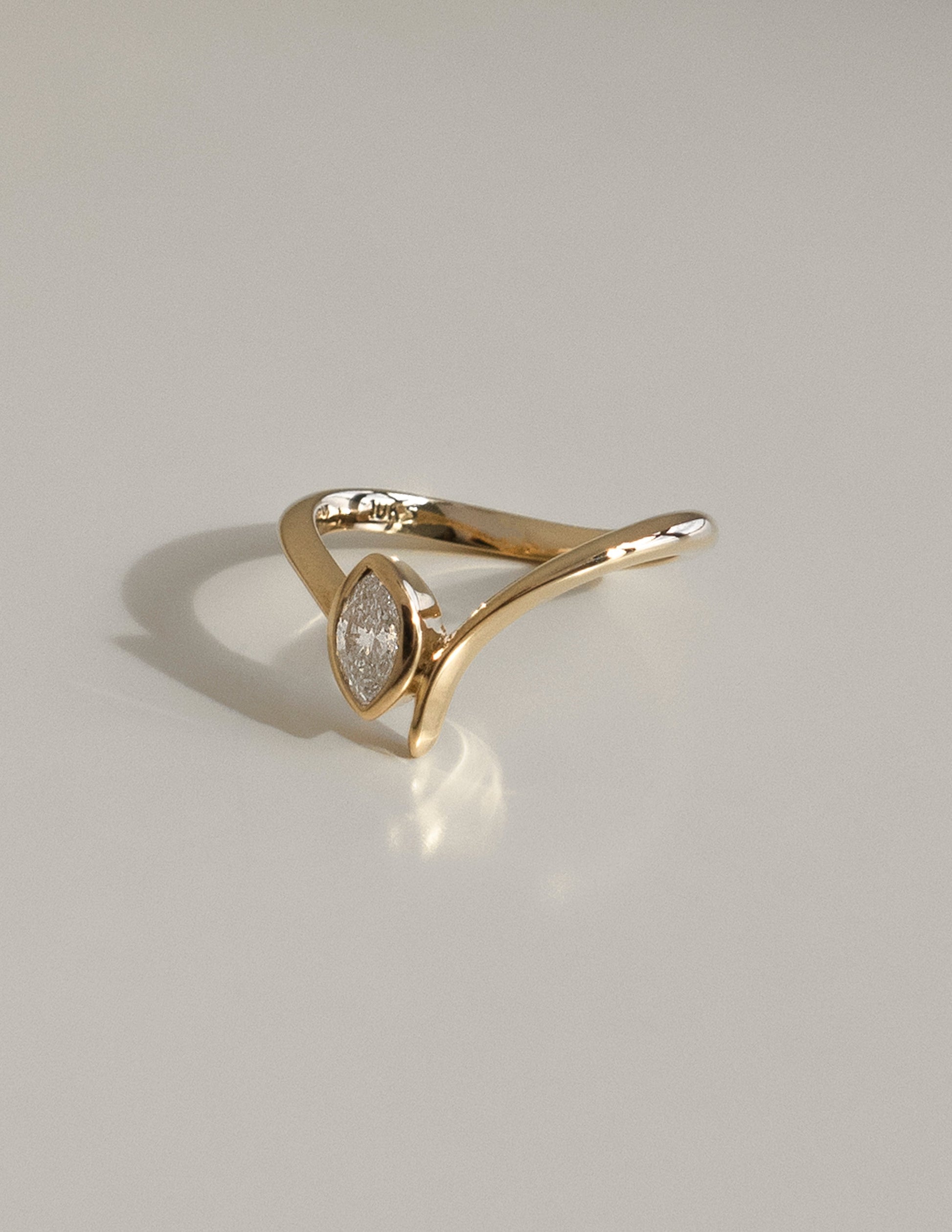 Solitaire Bezel Asymmetrical Band-Marquise Lab Grown Diamond Engagement Ring