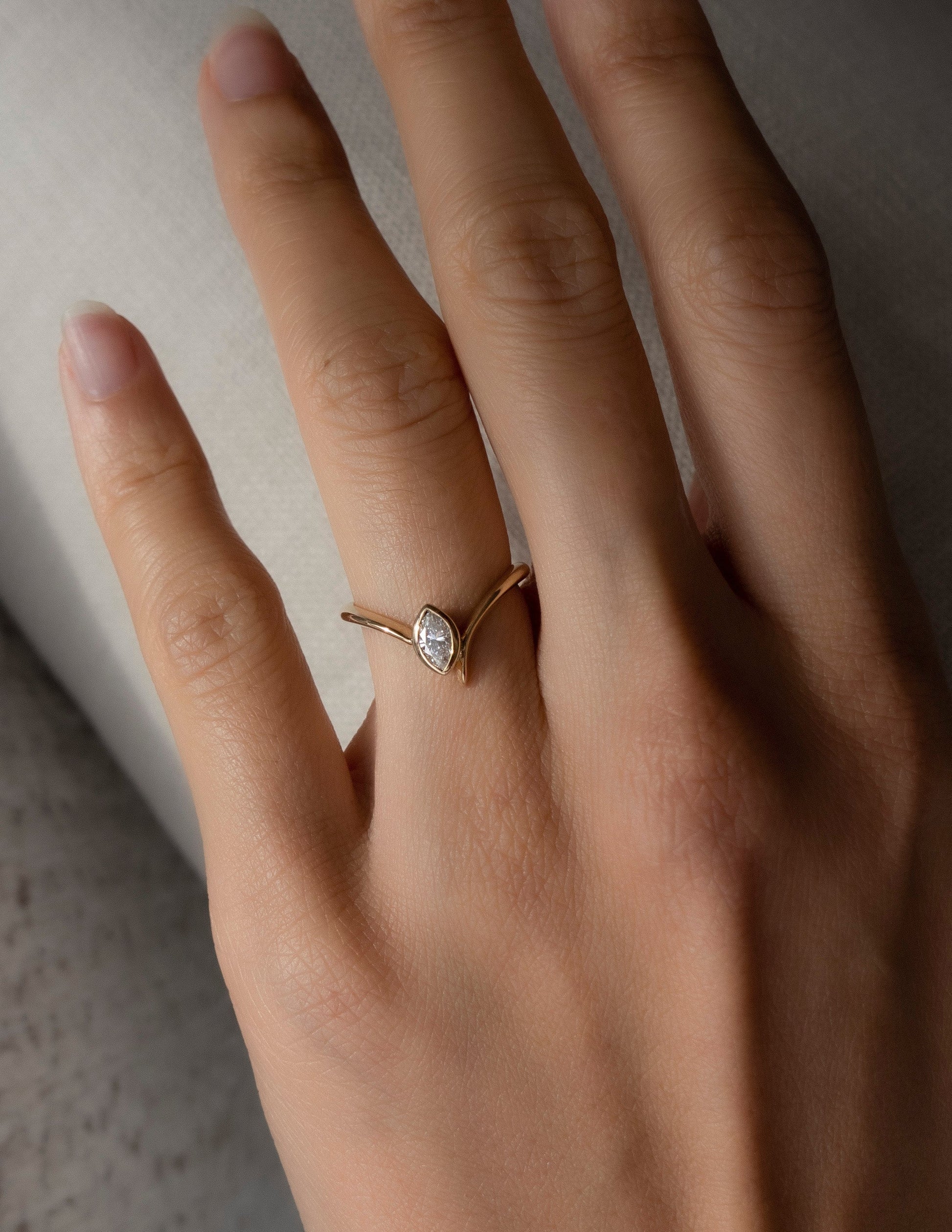 Solitaire Bezel Asymmetrical Band-Marquise Lab Grown Diamond Engagement Ring