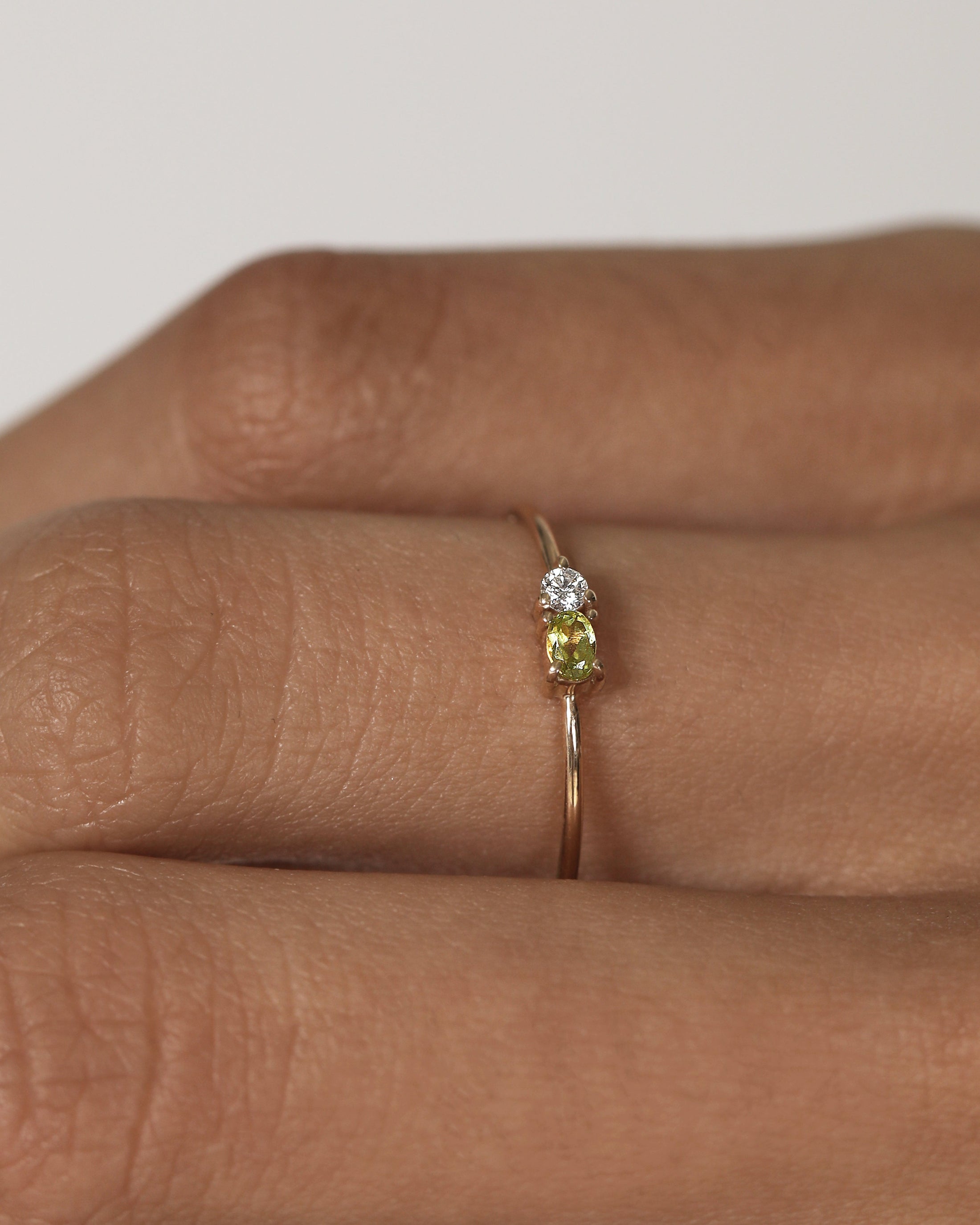 0.20 CT Oval Peridot & Lab-Made Diamond Wedding Band in Gold