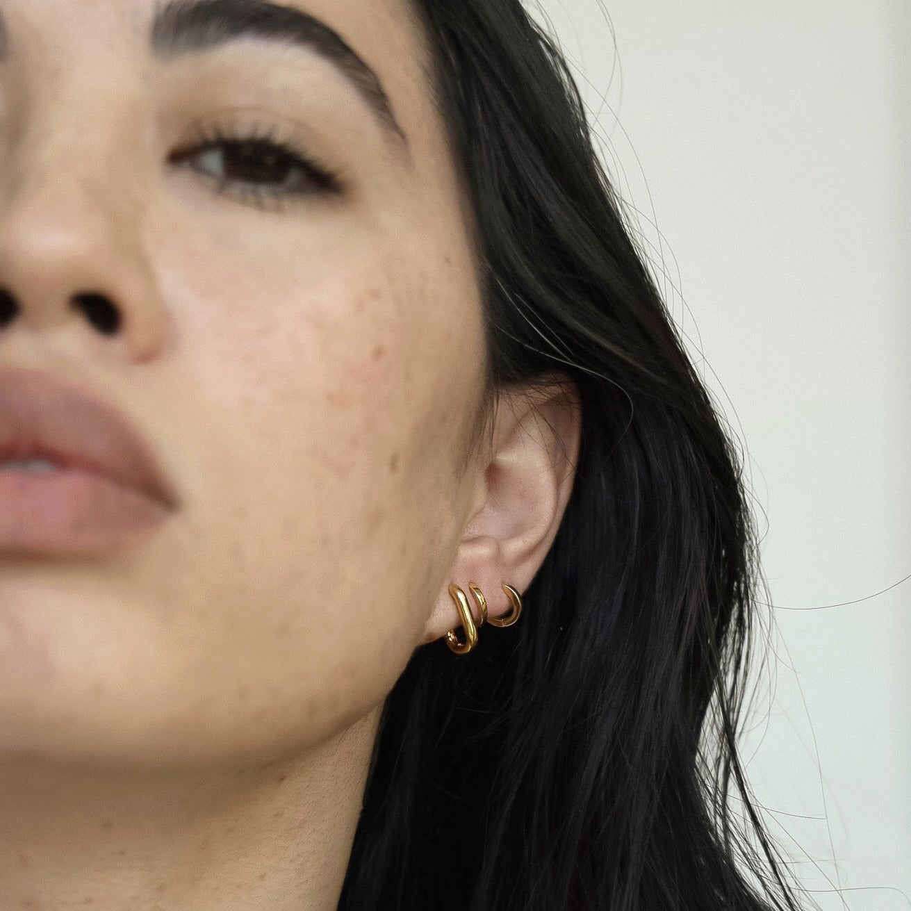 Sleek Gold Elongated Huggie Hoop Earrings 13