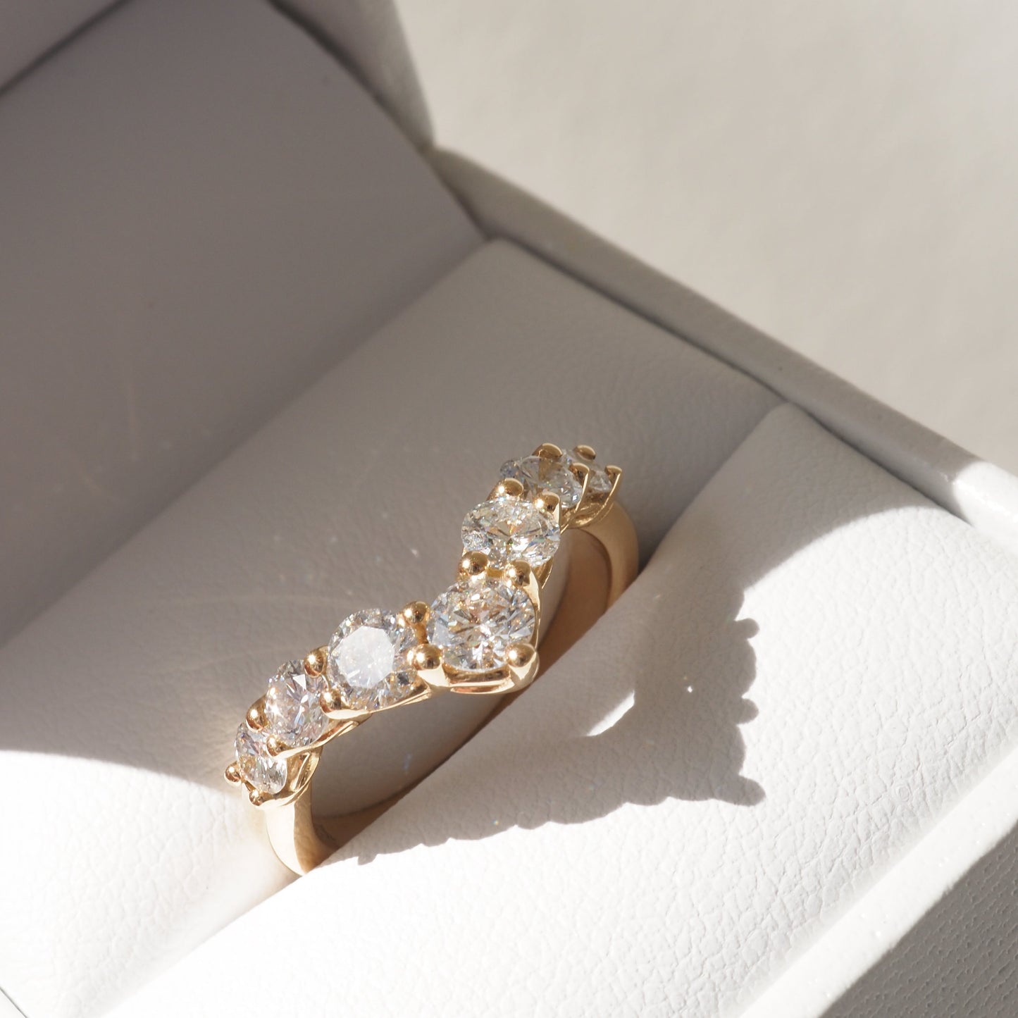 Elegant 1.10 TCW Round Lab-Grown Diamond Curved Wedding Band 1