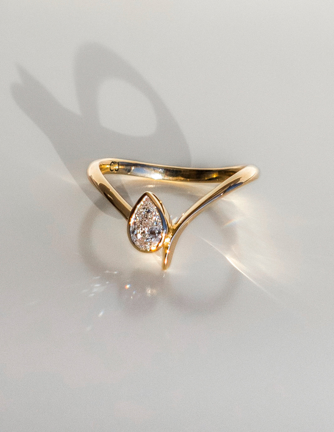 Solitaire Bezel Asymmetrical Band-Pear Lab Grown Diamond Engagement Ring