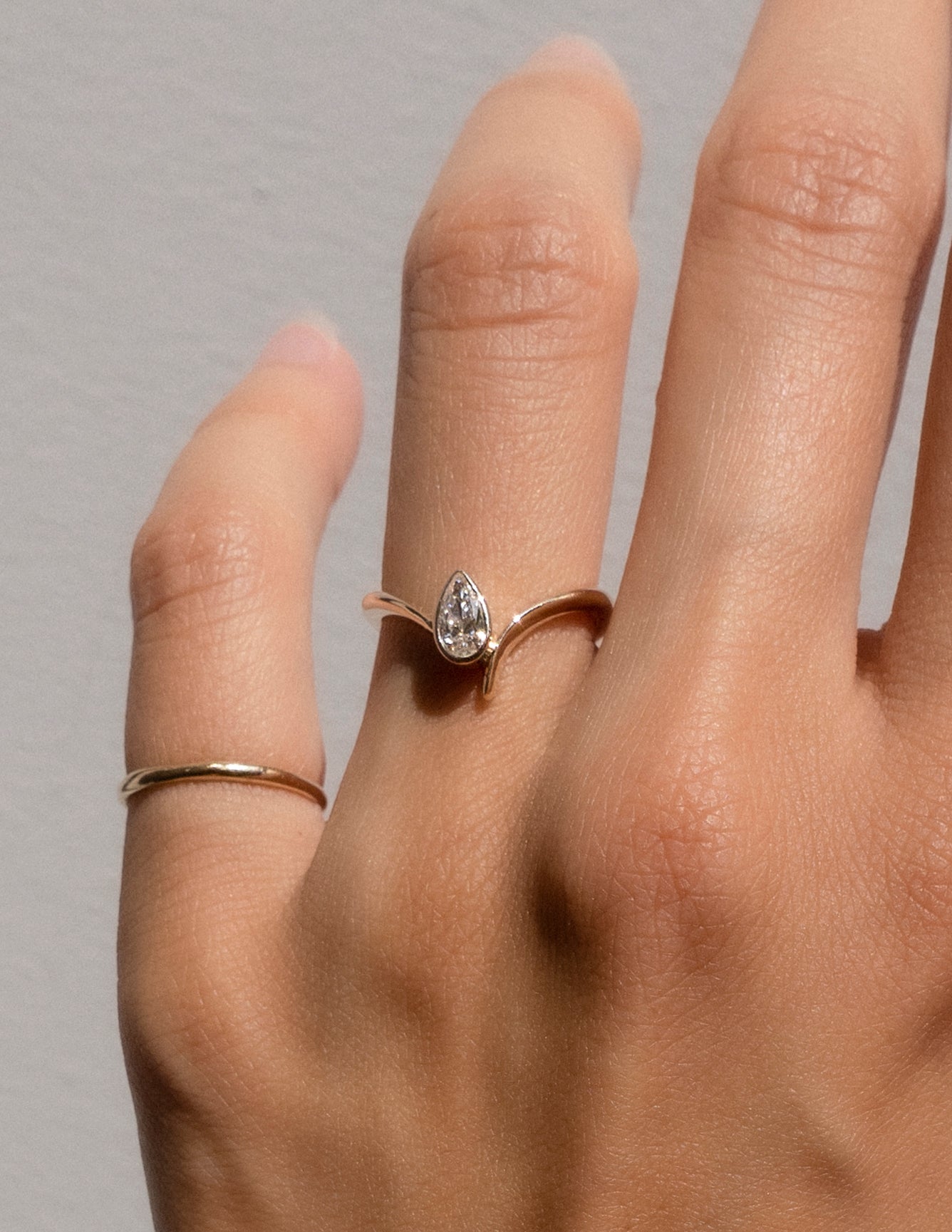 Solitaire Bezel Asymmetrical Band-Pear Lab Grown Diamond Engagement Ring