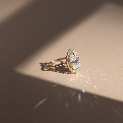 Graduated Halo-Oval Lab Grown Diamond Engagement Ring