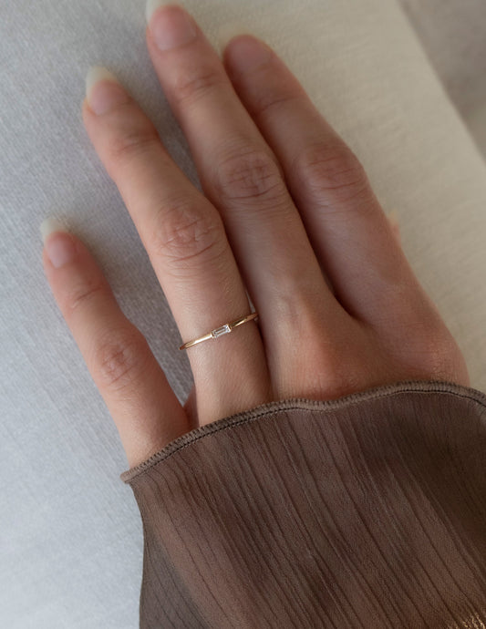 East West Solitaire Half Bezel | Stackable Ring- 0.06 CT Baguette Moissanite Wedding Band