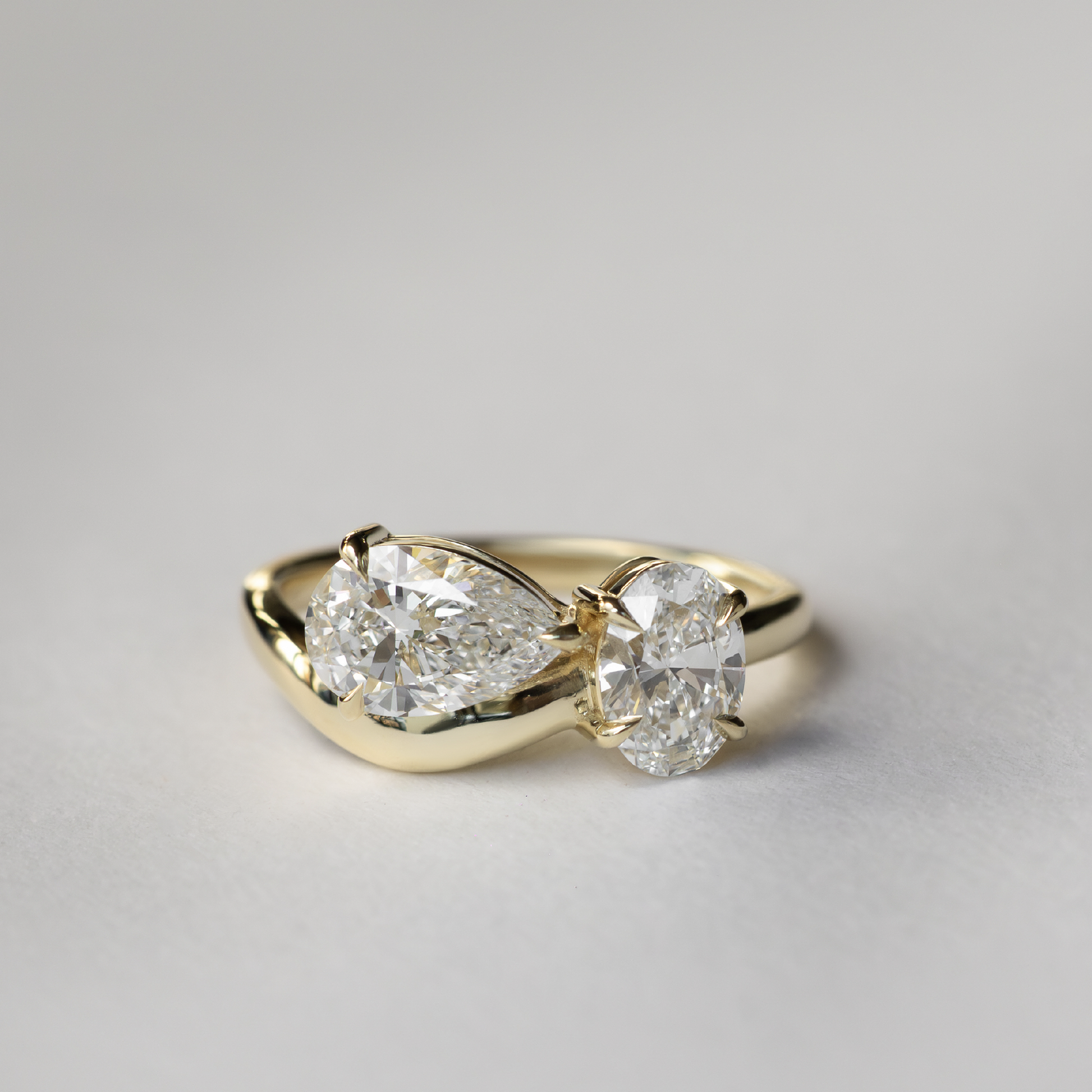 Toi Et Moi Curved Shank-Pear & Oval Lab Grown Diamond Engagement Ring