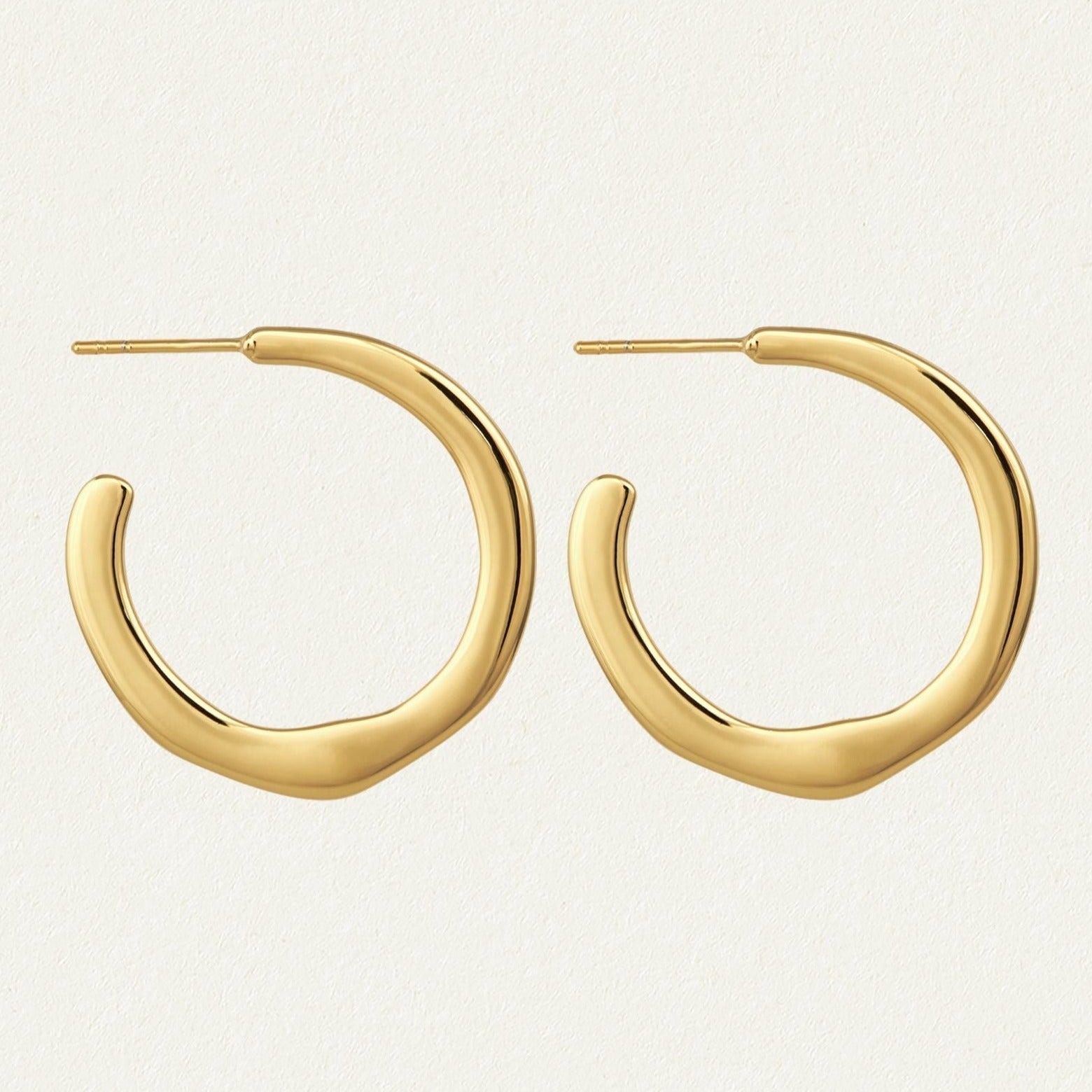 Elegantly Styled Solid Gold Hoop Earrings 1
