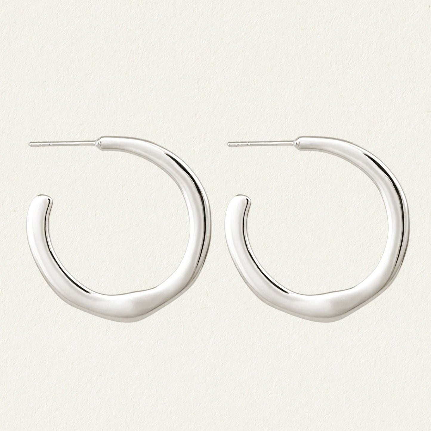 Elegant Silver Twist Hoop Earrings 1