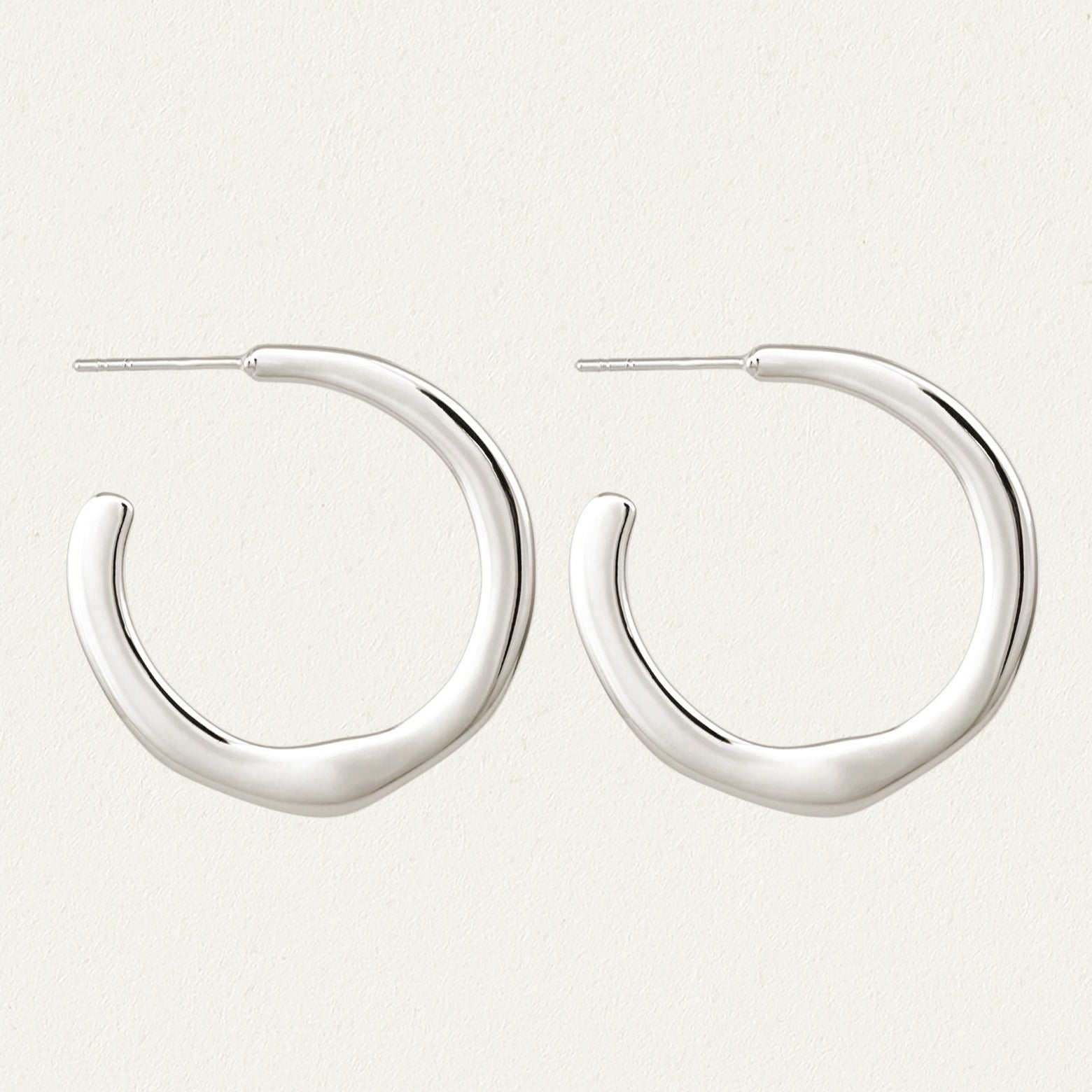 Elegant Silver Twist Hoop Earrings 1