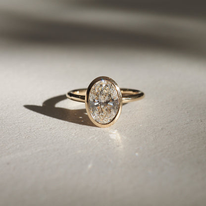 1.50 CT Oval Lab Grown Diamond Bezel Solitaire Engagement Ring 1