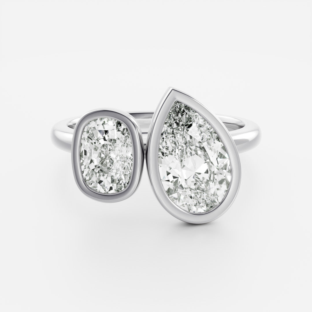 Toi Et Moi Bezel-Pear & Elongated Cushion Lab Grown Diamond Engagement Ring